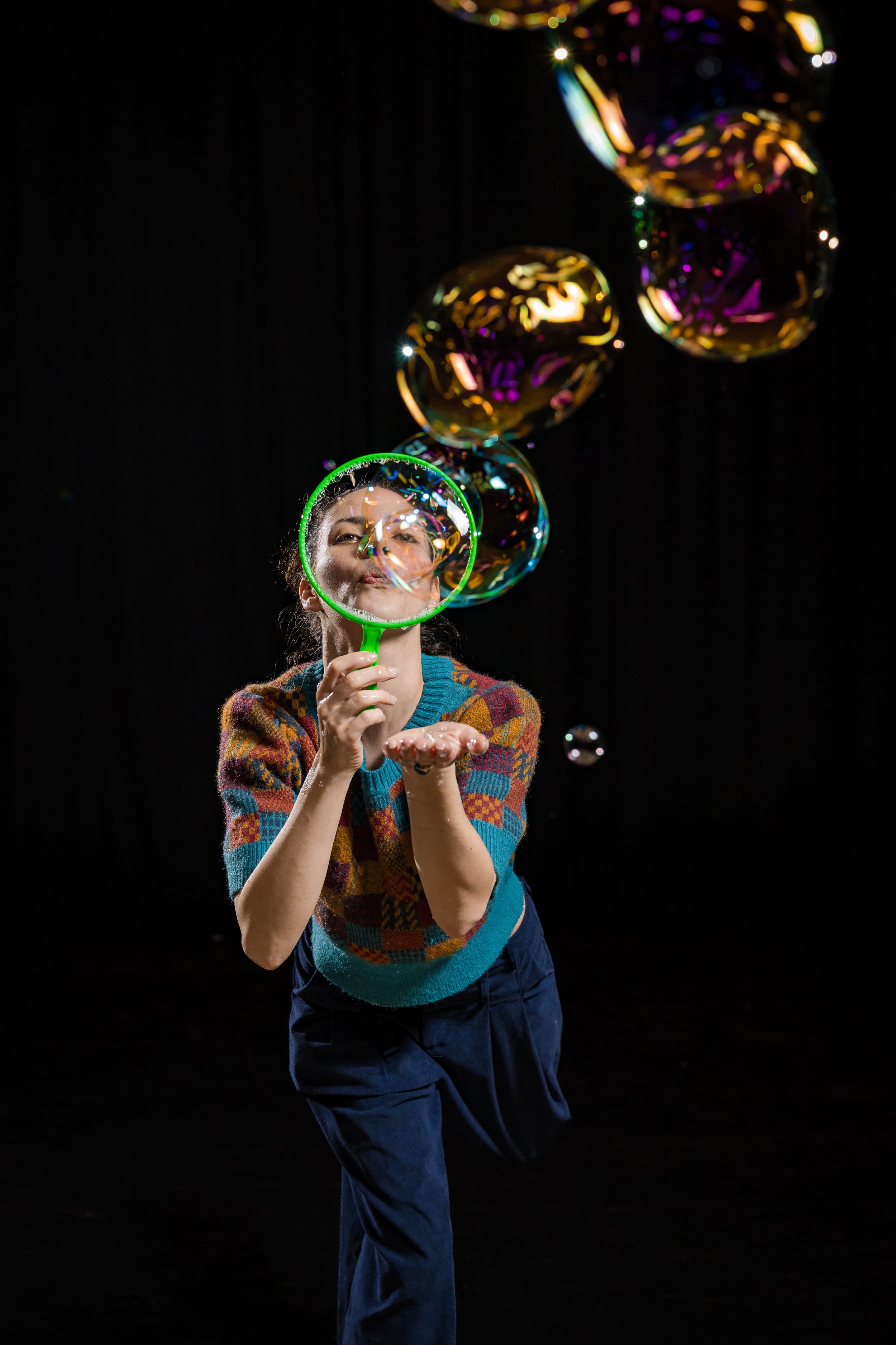 corporate-workshop-photographer-manchester-participant-blowing-giant-iridescent-bubbles-039.jpg