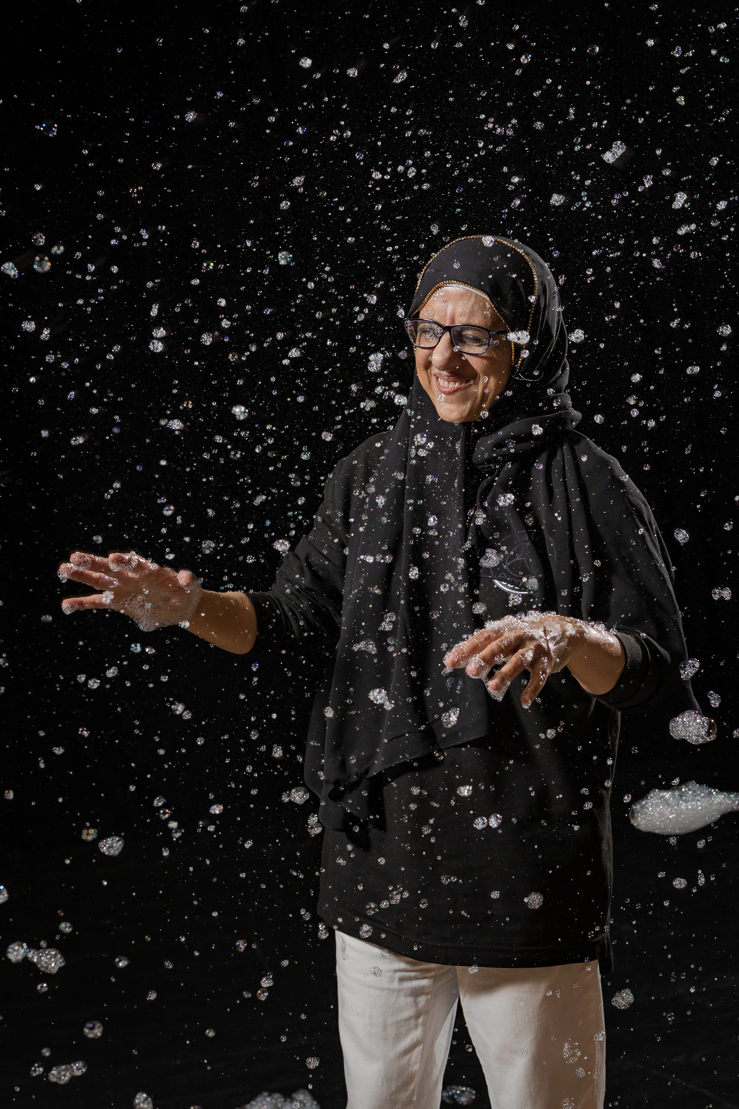 corporate-workshop-photographer-manchester-participant-bubble-foam-explosion-laughing-011.jpg