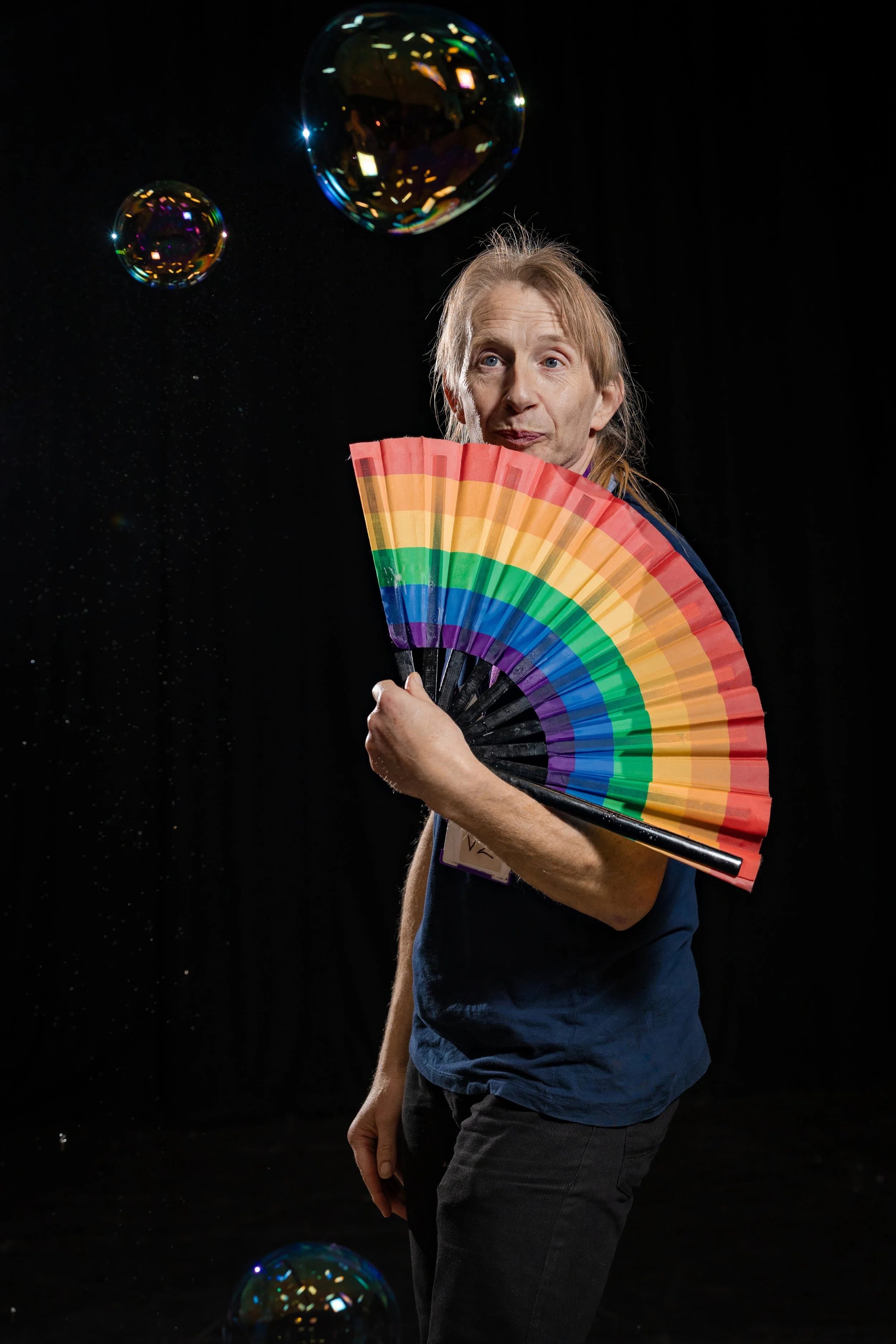 corporate-workshop-photographer-manchester-participant-rainbow-fan-iridescent-bubbles-035.jpg