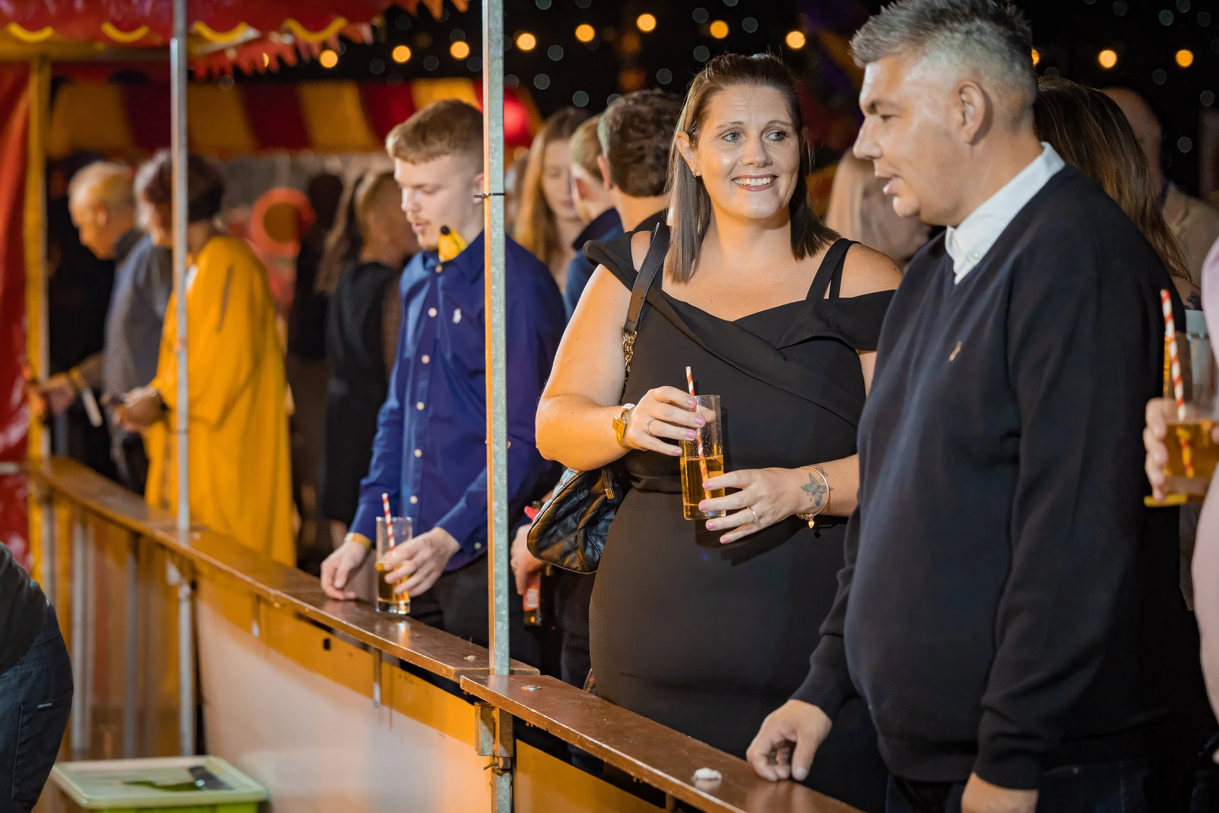 networking-event-photography-guests-drinks-fairground-stall.jpg