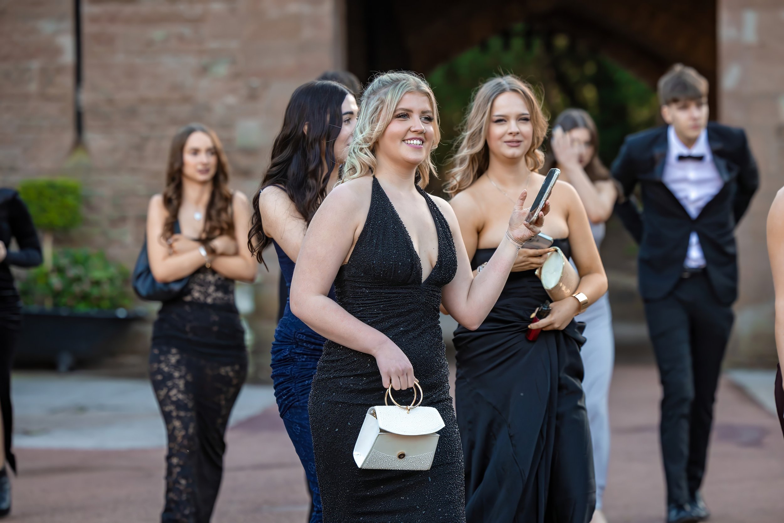 summer-ball-guests-formal-dresses-arriving-castle.jpg