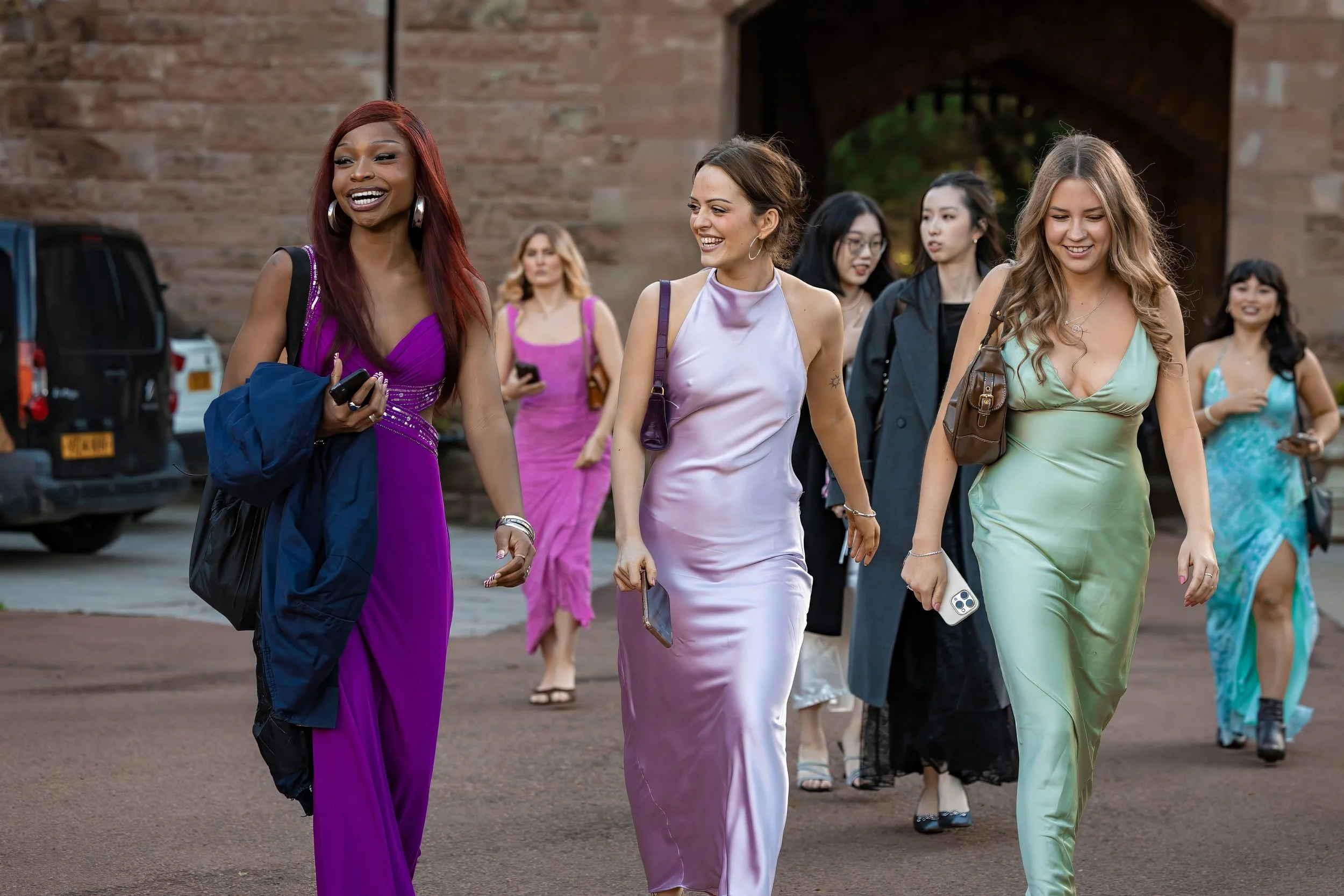 university-summer-ball-guests-arriving-castle-courtyard.jpg