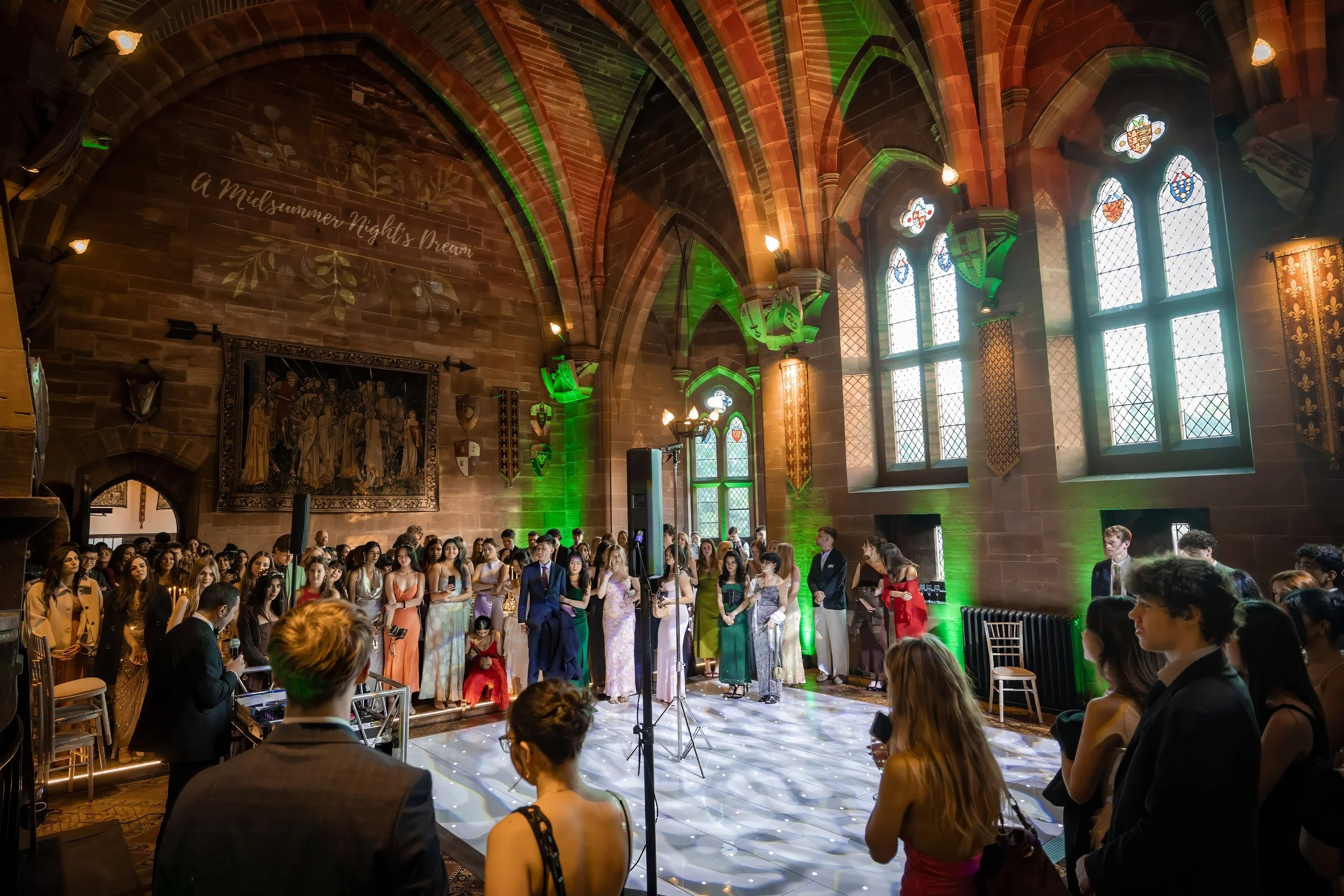 peckforton-castle-great-hall-summer-ball-entertainment-crowd.jpg