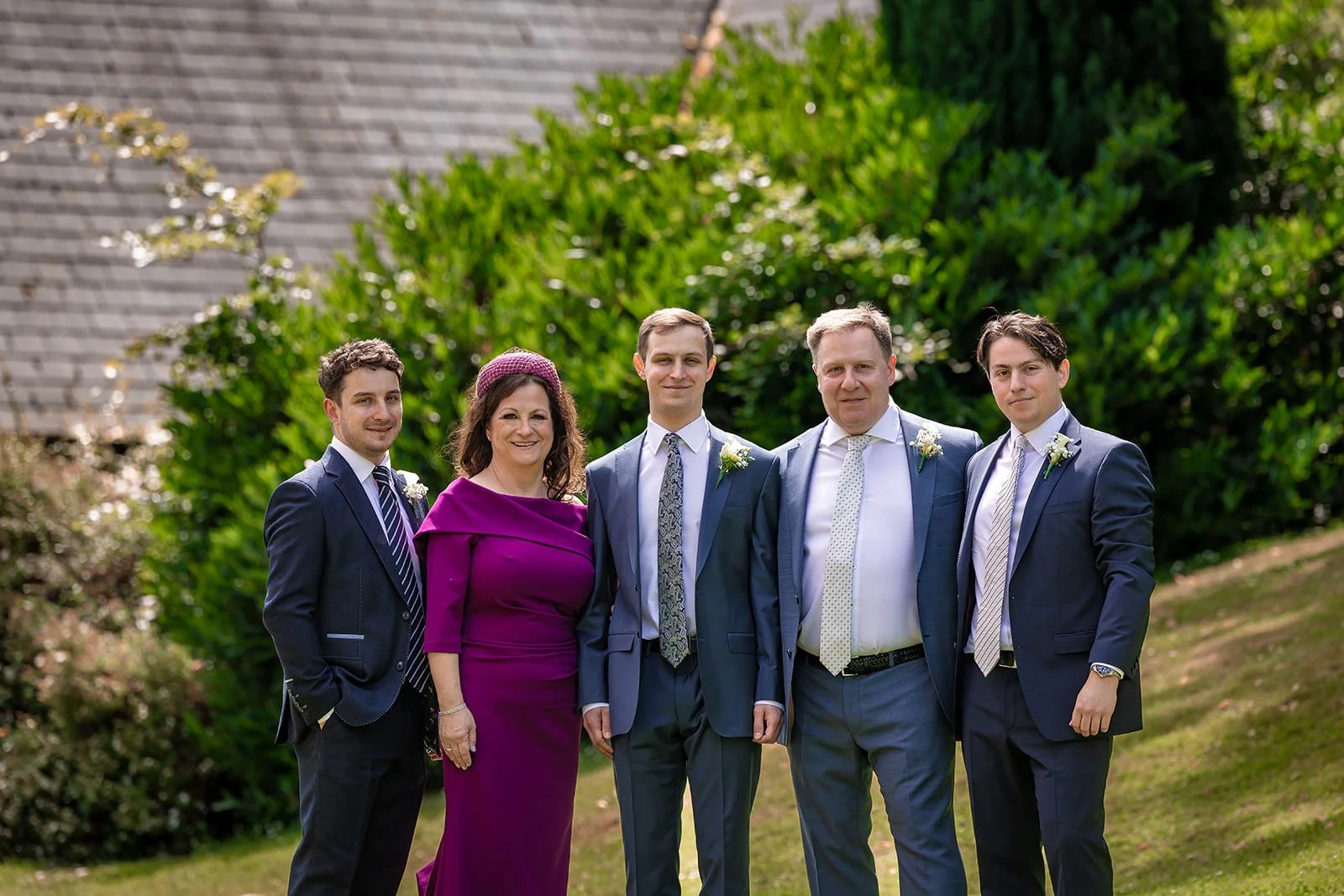 outdoor family wedding portrait at worsley marriott hotel