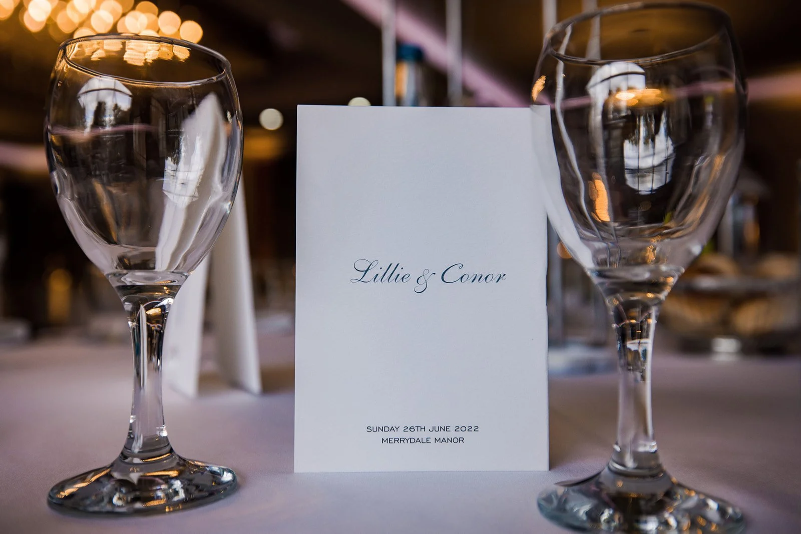 Merrydale Manor wedding reception table with glasses and menu card – wedding photography North West