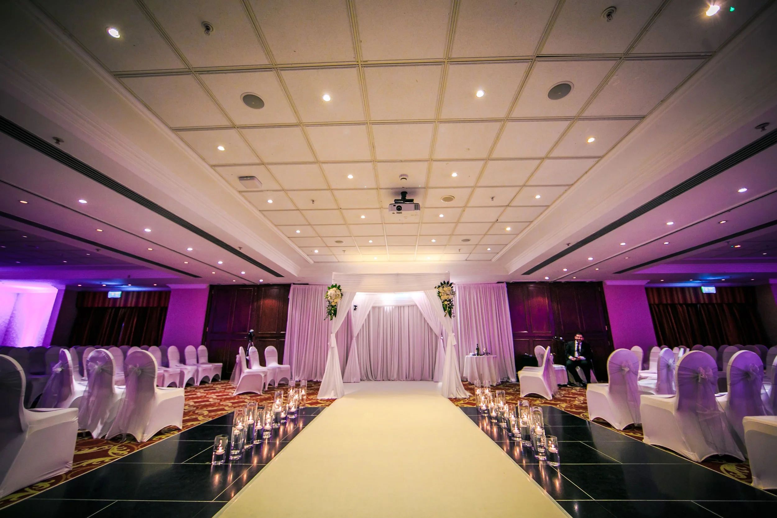 indoor wedding ceremony room set up at worsley marriott hotel