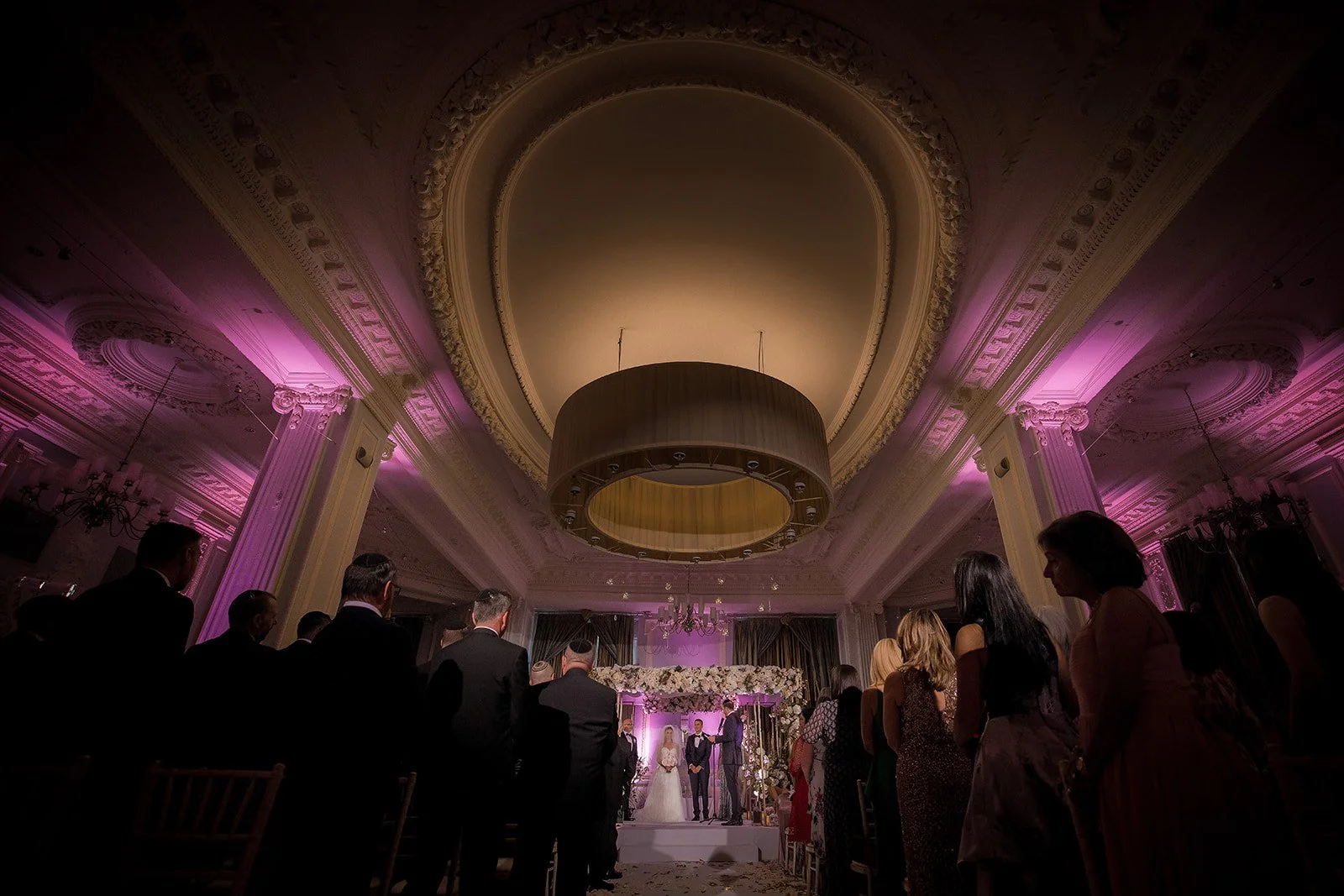 wide angle from back of trafford suite of jewish wedding ceremony at midland hotel