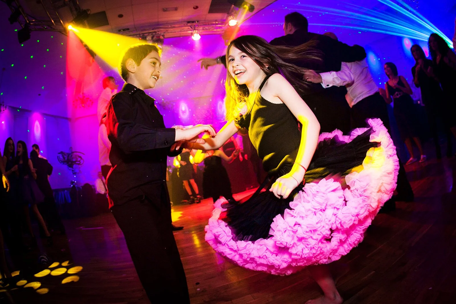 children dancing during barmitzvah party celebration in Manchester