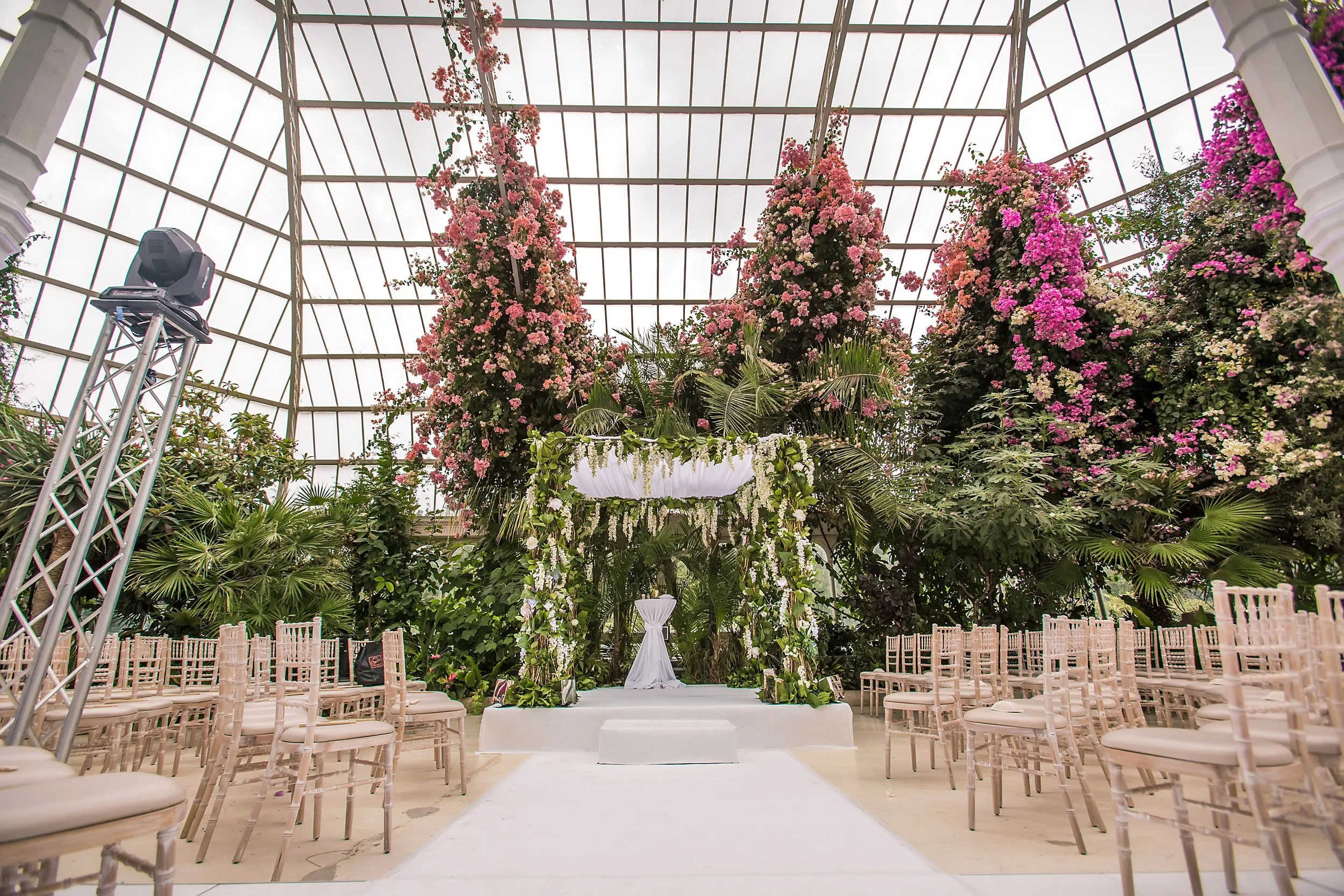 wedding ceremony set up inside sefton park palm house in liverpool