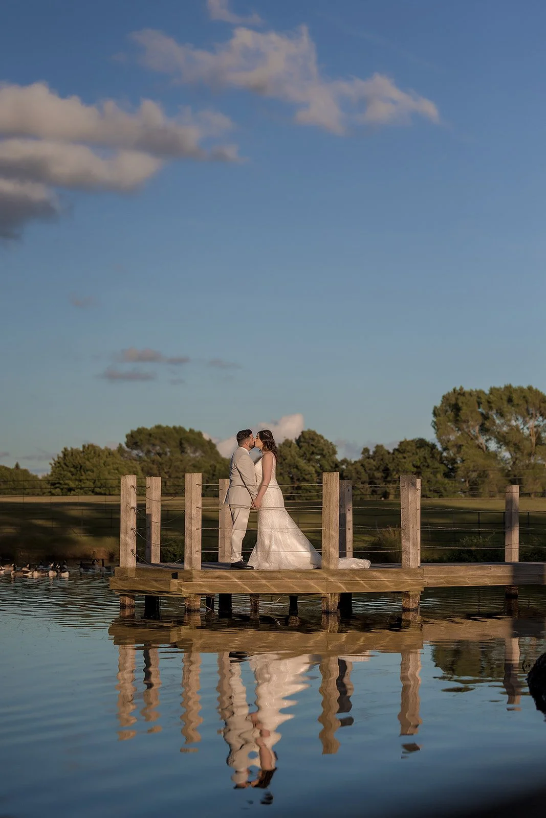 Merrydale Manor wedding couple on wooden dock at sunset – fine art wedding photographer North West