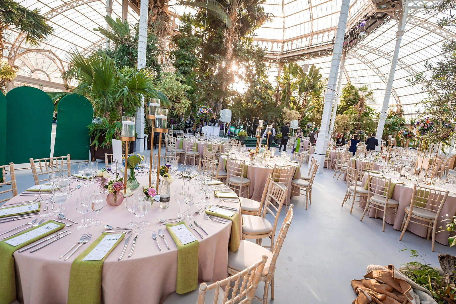 sefton park palm house wedding venue interior set up with tables and decor for reception dinner and dancing