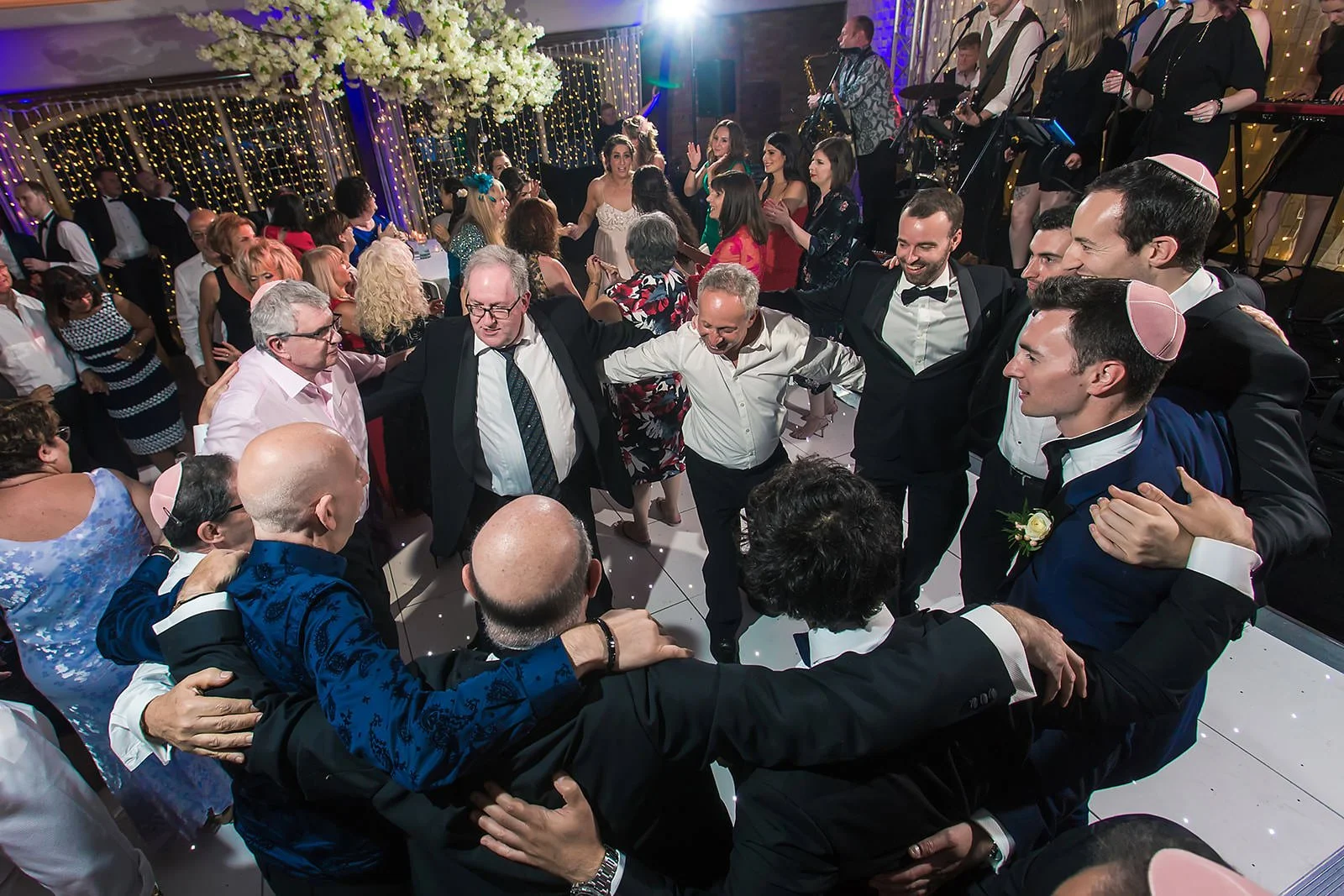 men dancing during wedding at colshaw hall