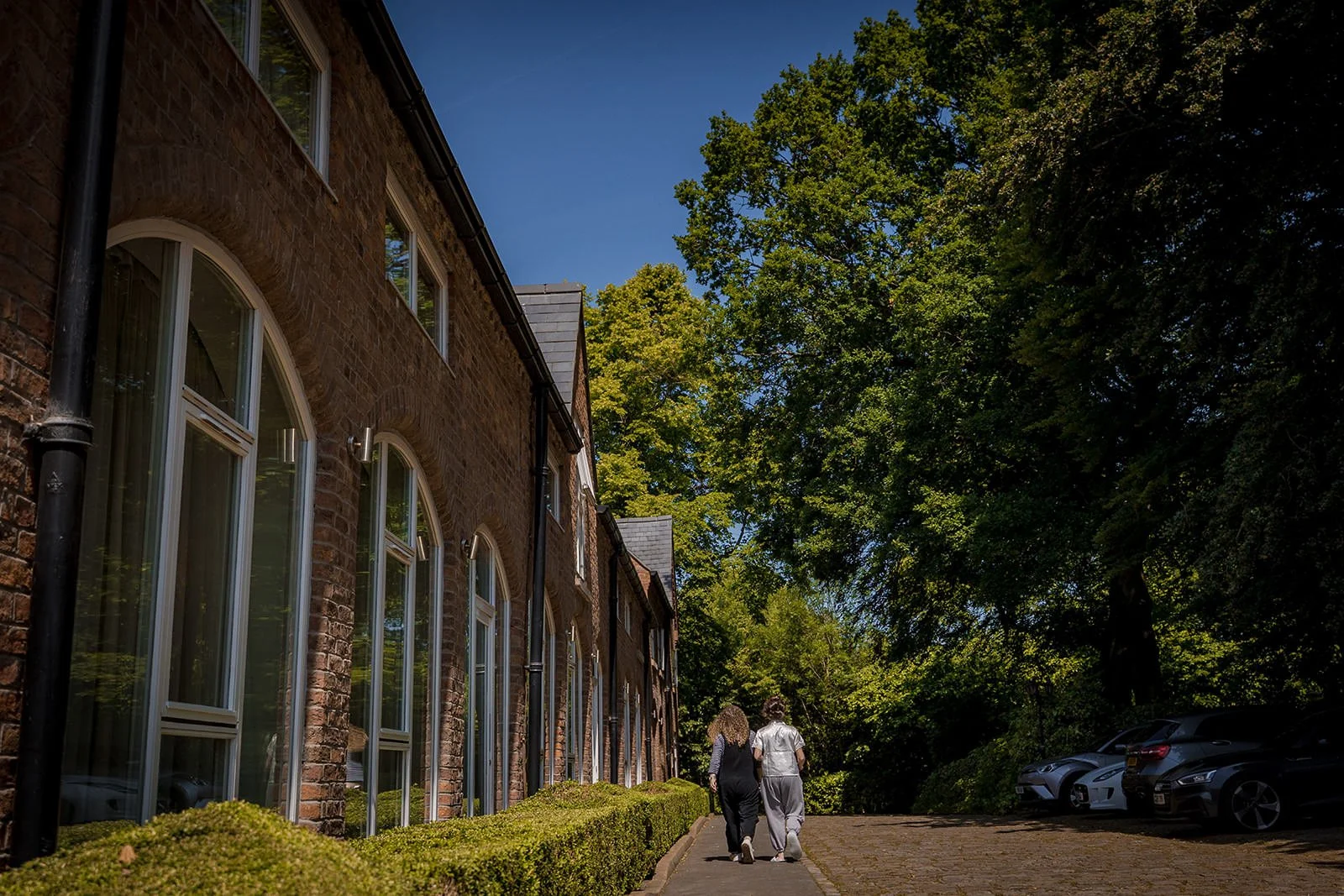 bride walking to bridal prep at worsley marriott hotel