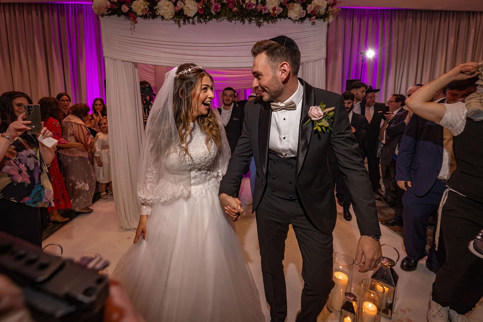 bride and groom leave wedding ceremony at manchester deansgate hotel