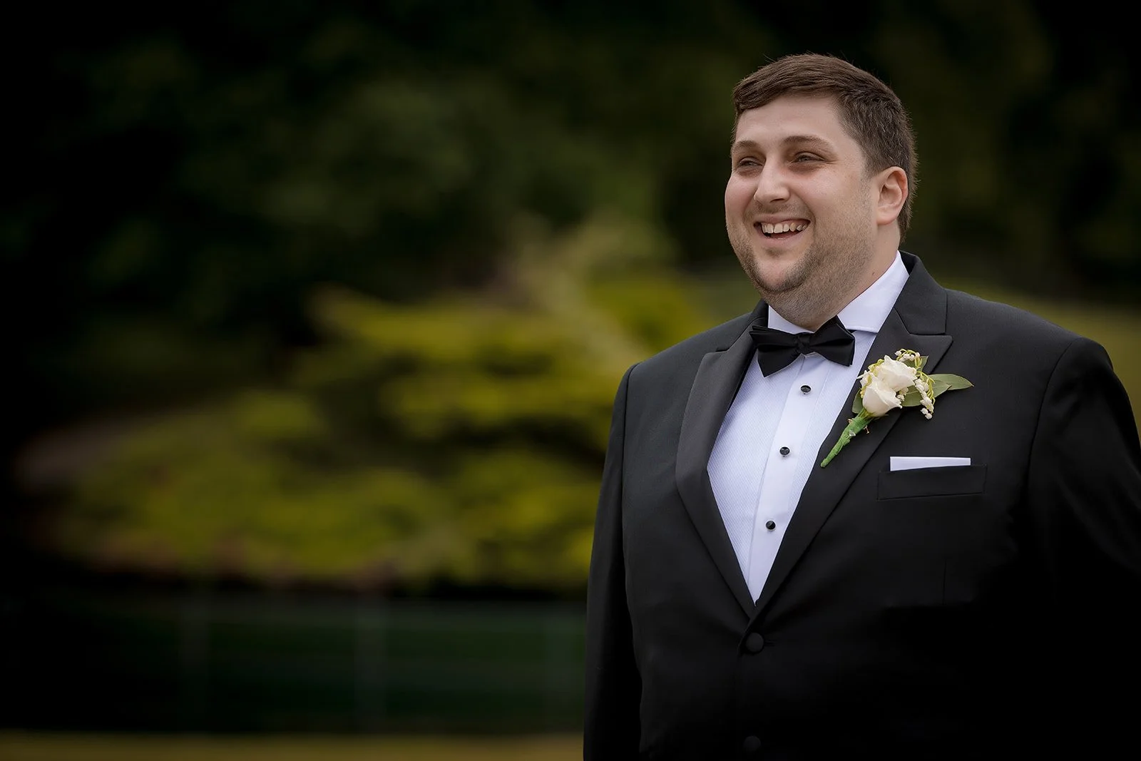 Merrydale Manor wedding groom portrait in tuxedo outdoors – wedding photography North West