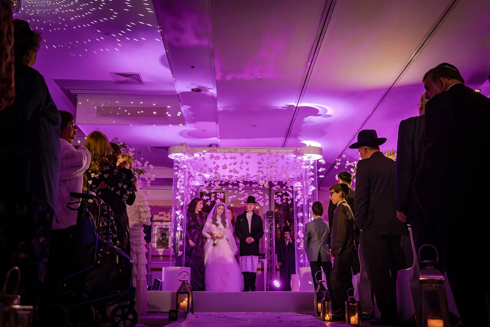 bride and groom exchange vows during indoor wedding ceremony at last drop village in bolton