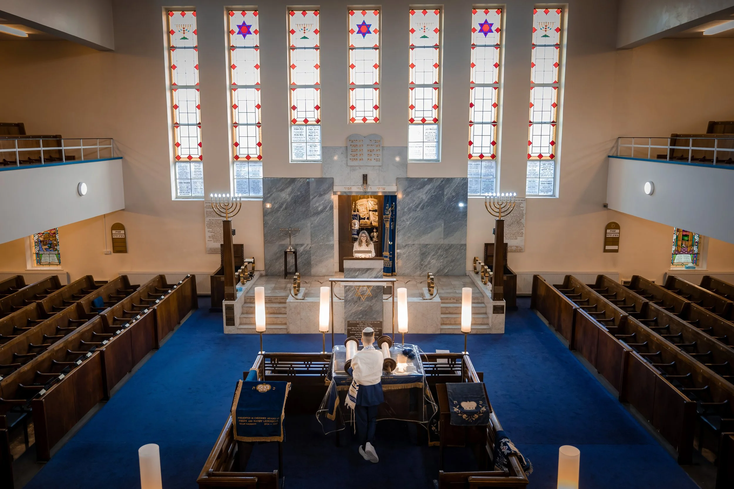 barmitzvah boy and batmitzvah girl twins in synagogue during rehearsal in Manchester