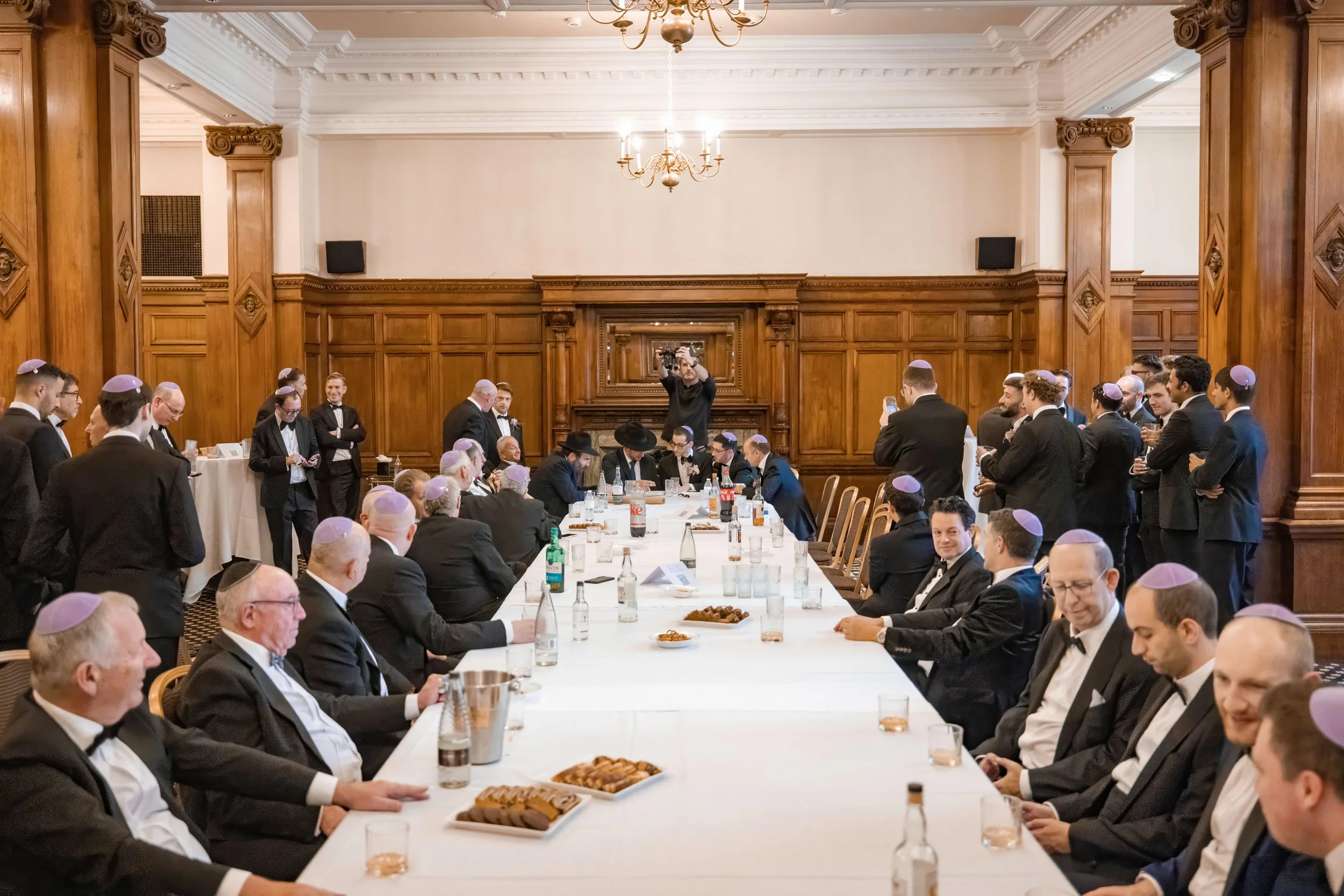 manchester wedding photography jewish groom and men in tish at the Midland hotel