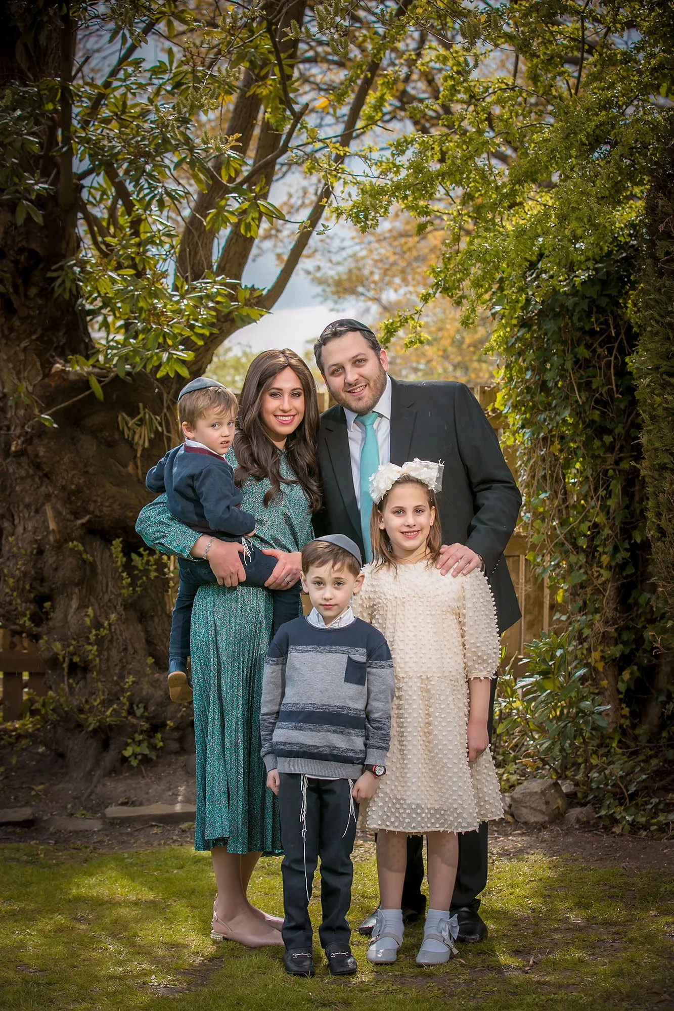 formal family portrait in garden