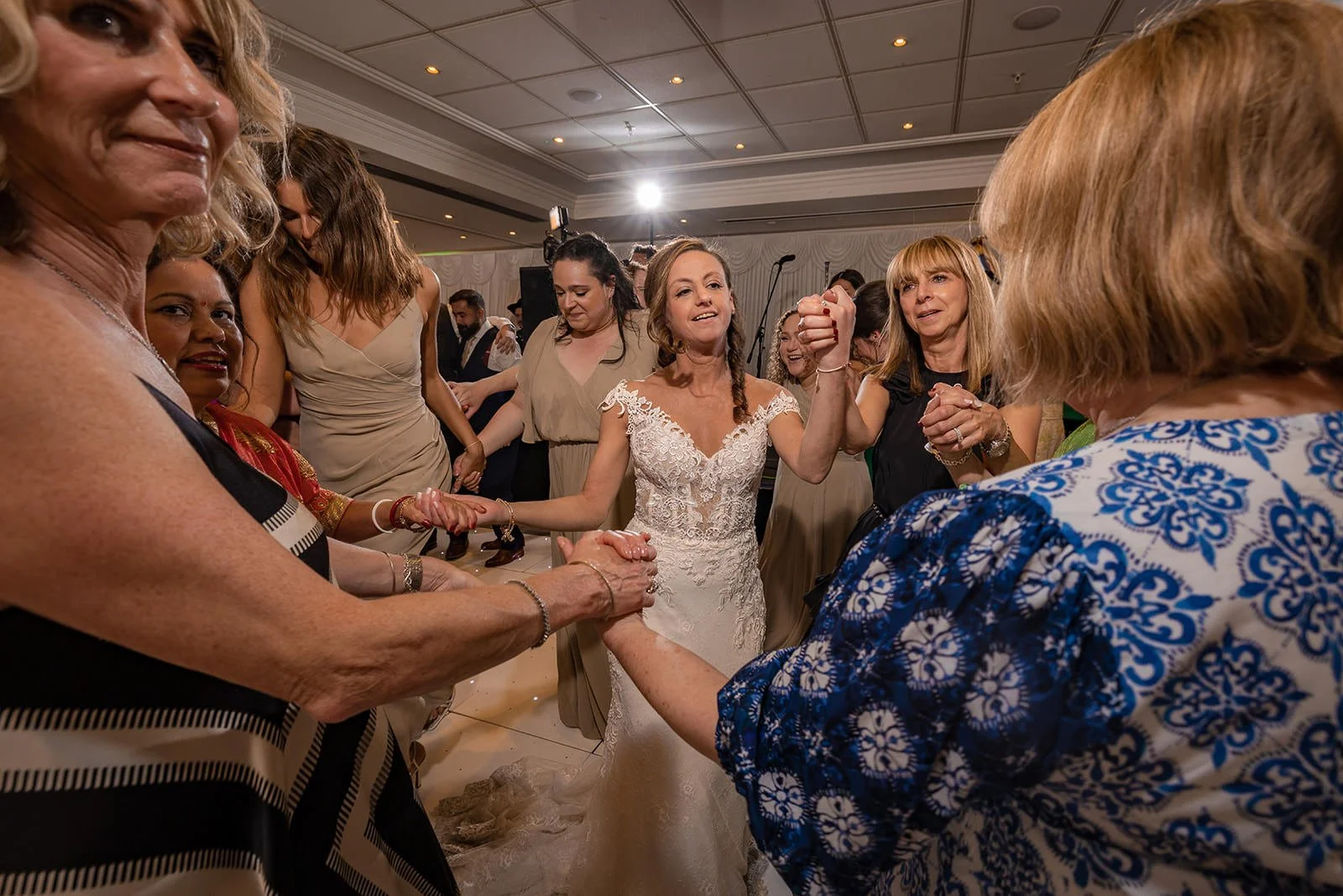 bride dancing with guests during reception party at worsley marriott hotel