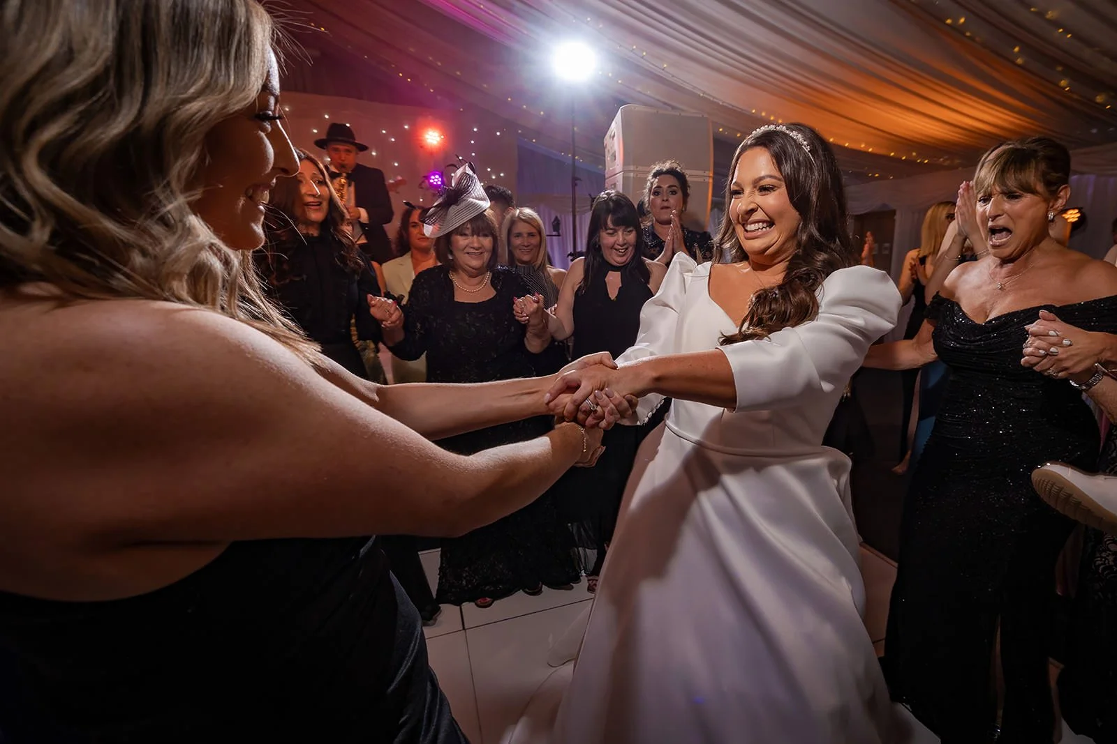 bride dancing during wedding reception at heaton house farm