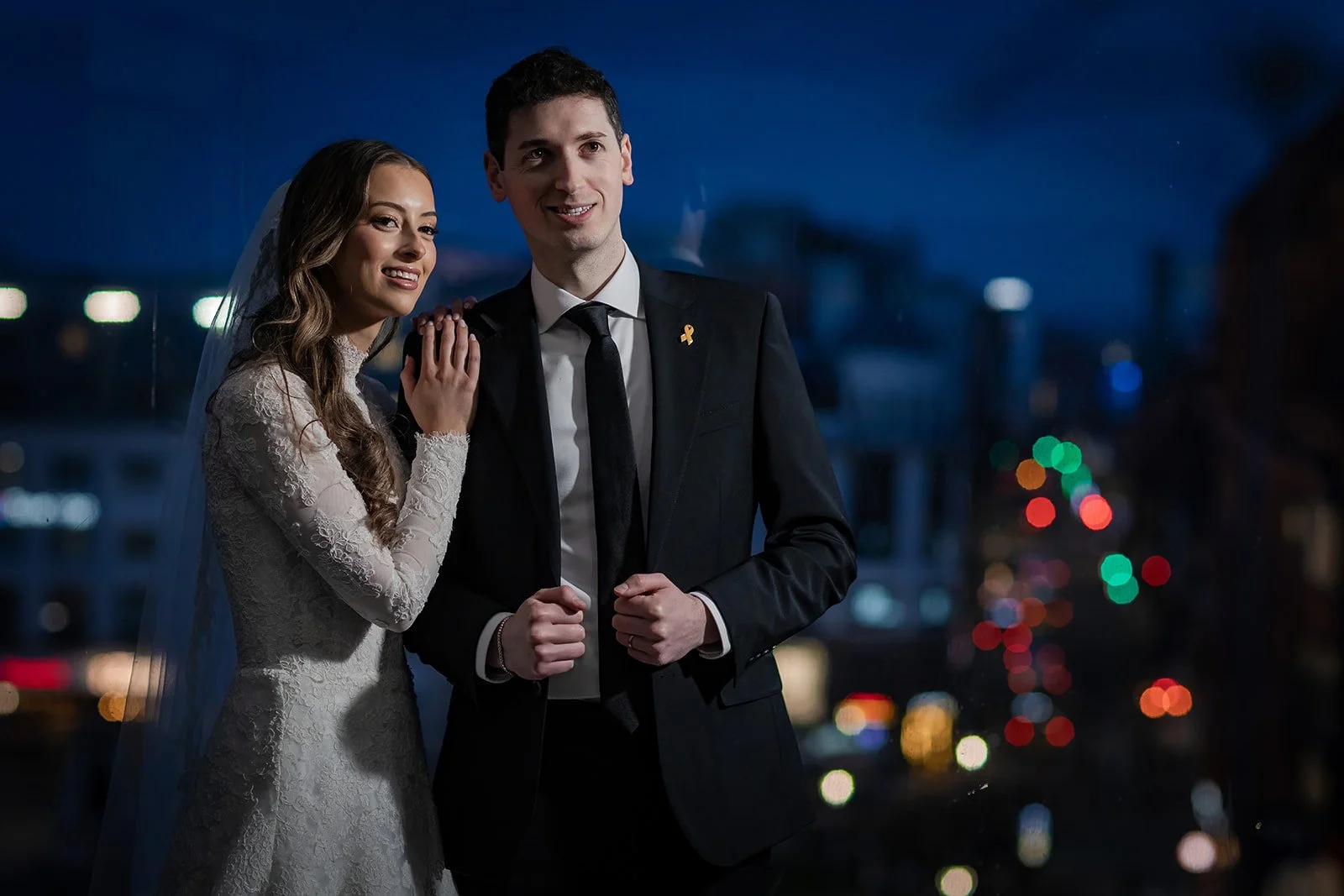 bride and groom newlywed couple portrait in mercure manchester piccadilly with city view