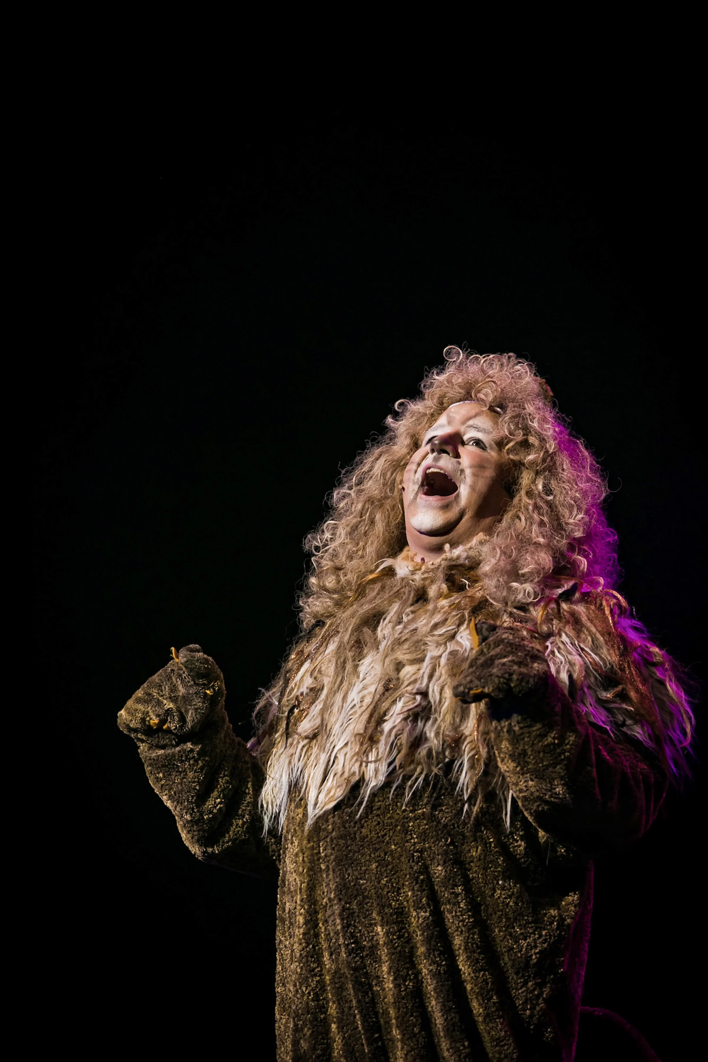 lion in wizard of oz production on stage theatre performance dramatic photography portrait with make-up and costume