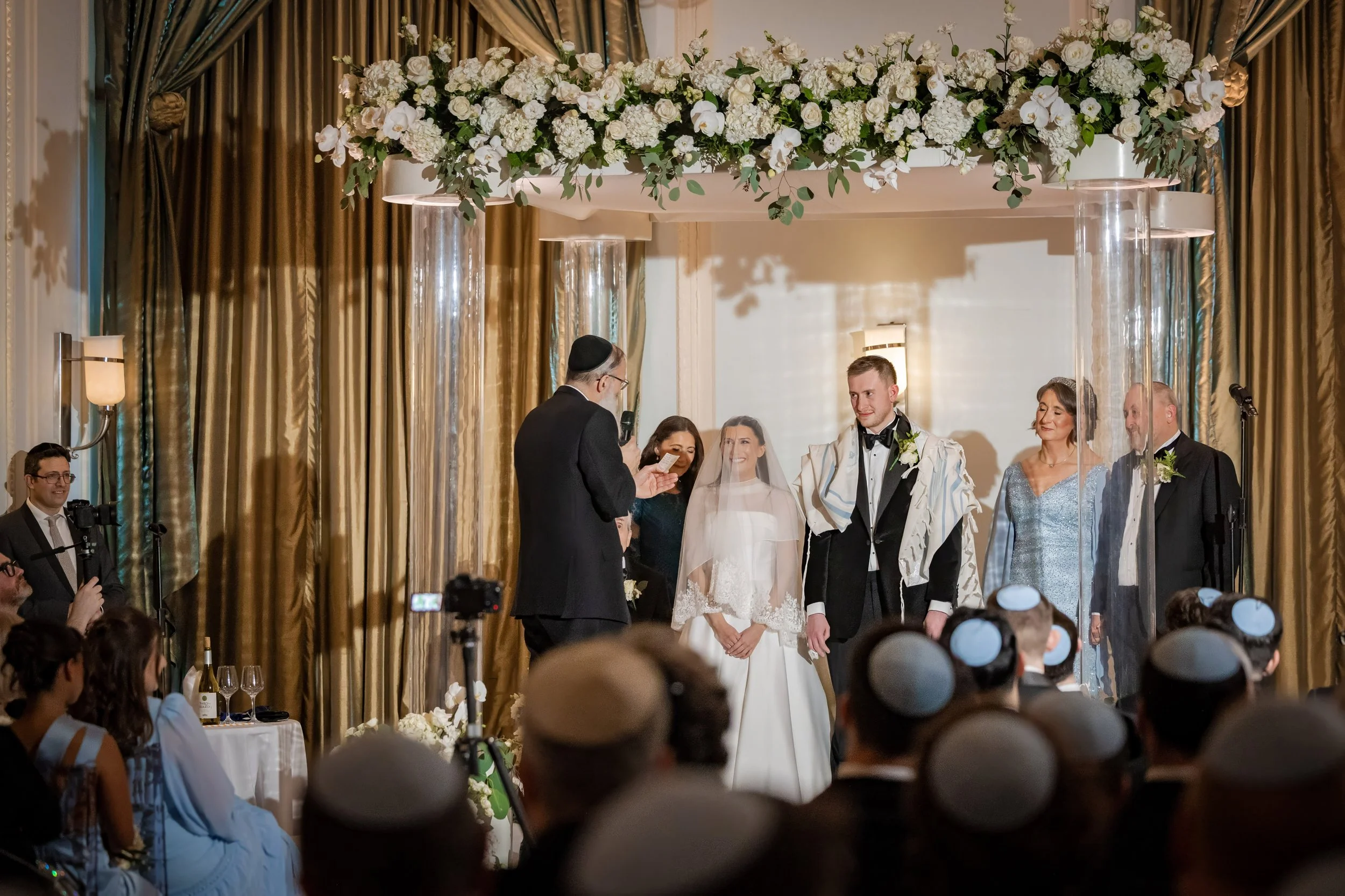 bride and groom under chuppah at midland hotel jewish wedding ceremony