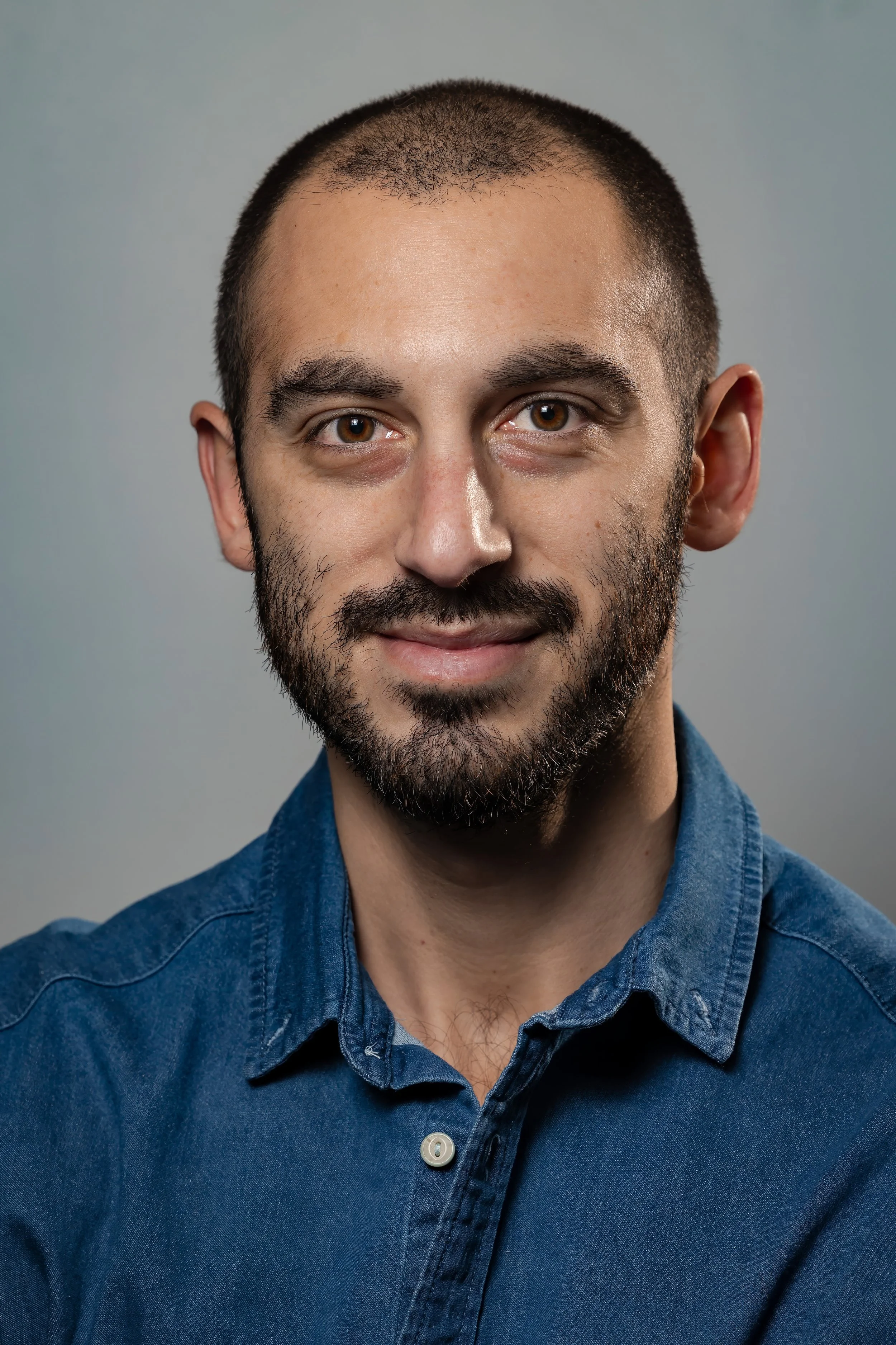 Professional headshot for a company website and LinkedIn profile