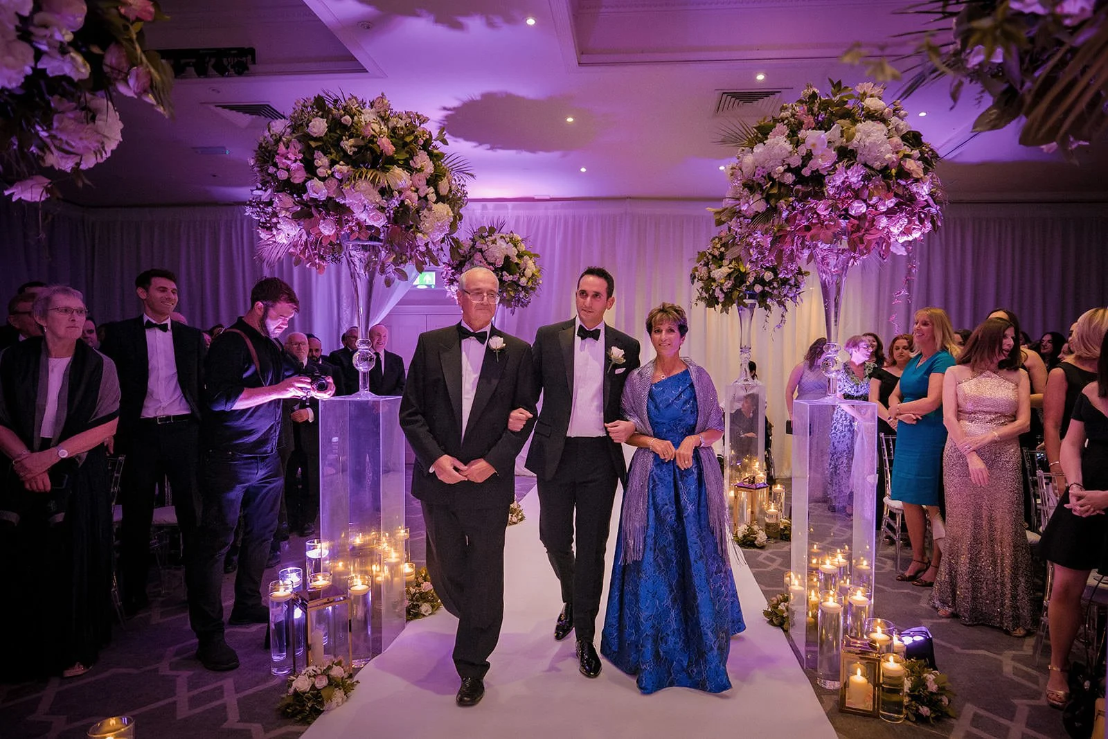 Ceremony processional with candlelit floral aisle, Fairmont Cheshire - The Mere
