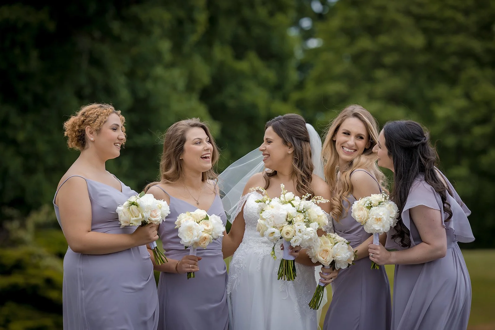 bridal portrait with bridesmaids during wedding at merrydale manor