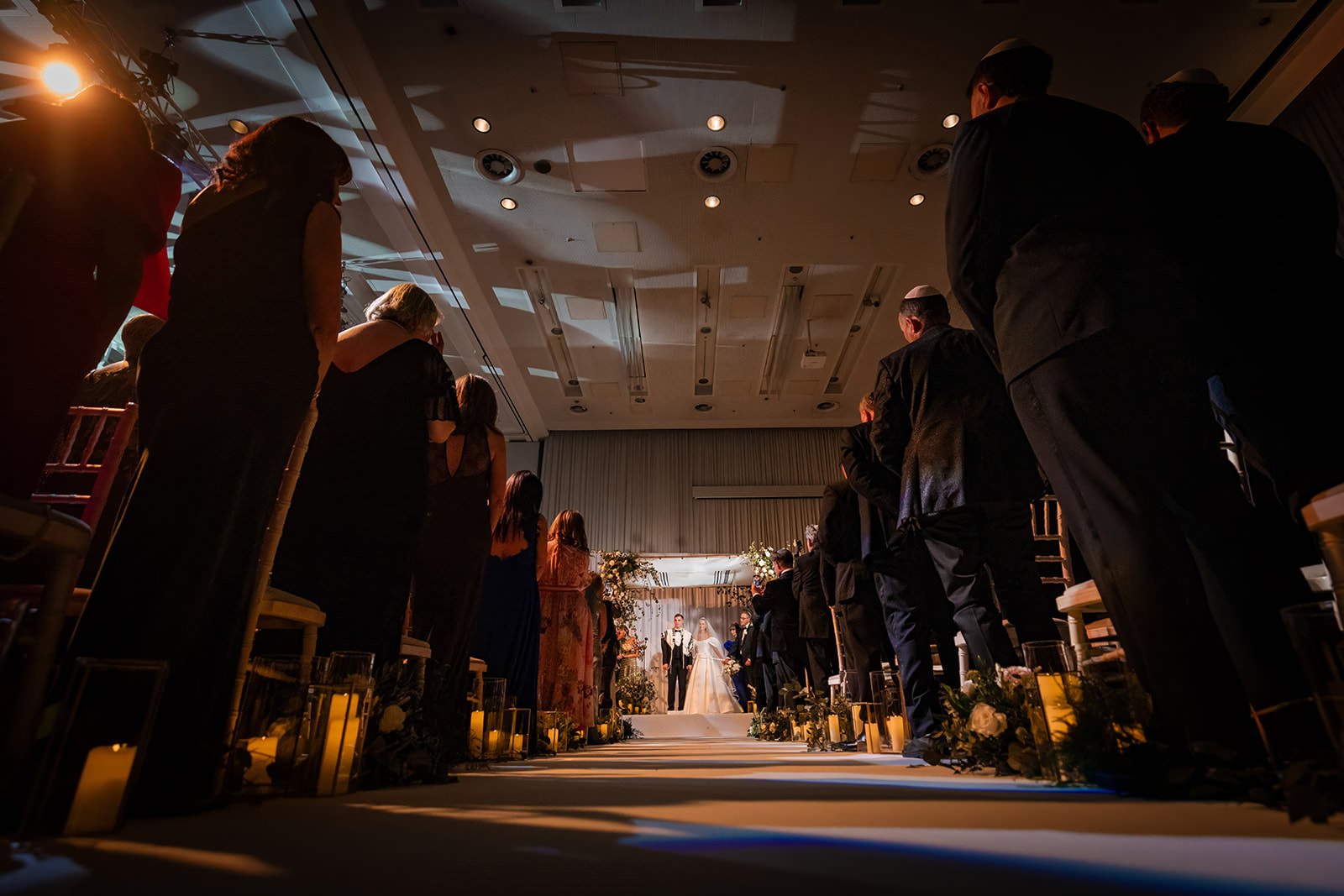 bride and groom exchange vows during wedding ceremony at manchester deansgate hotel