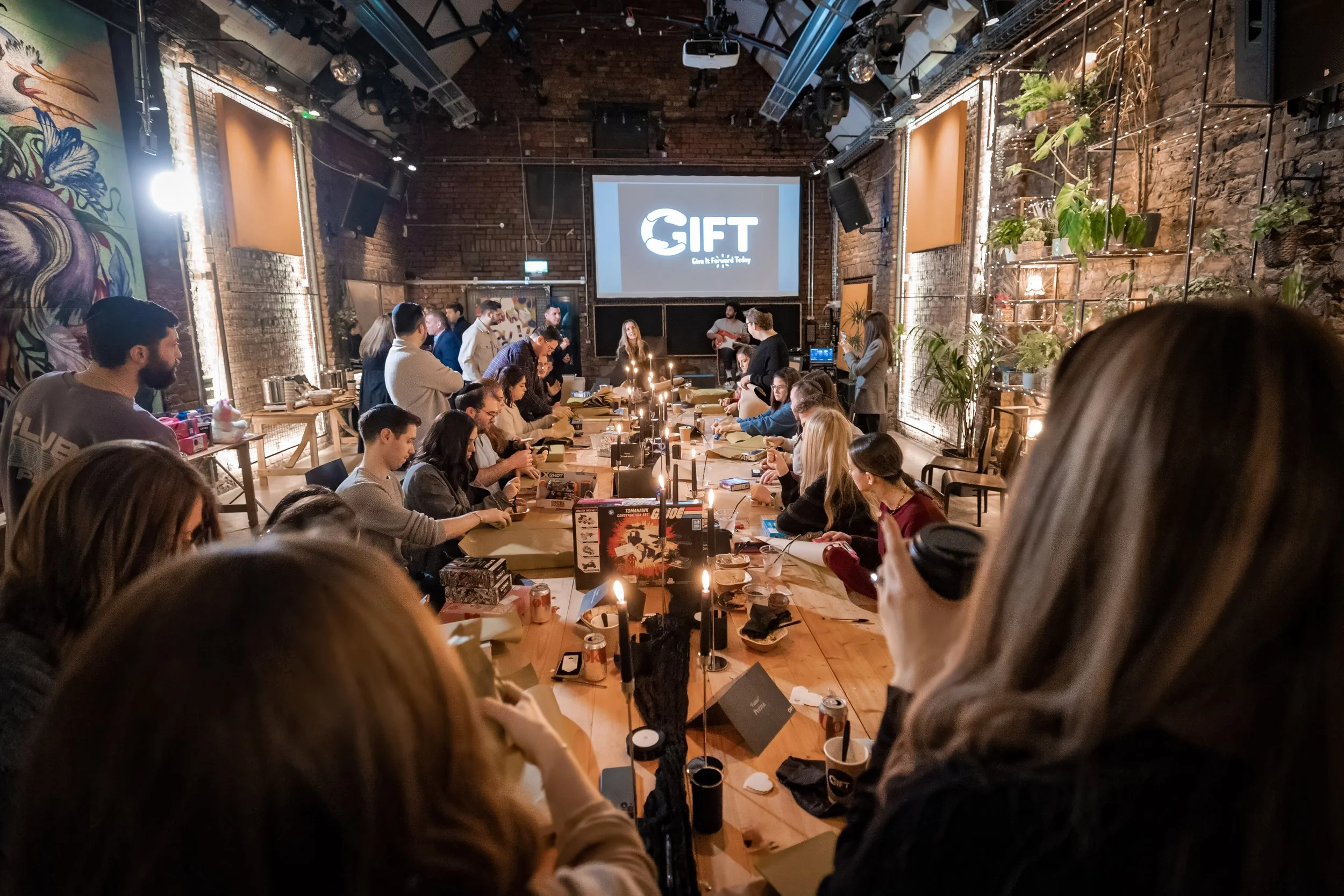 charity gift wrapping event wide angle