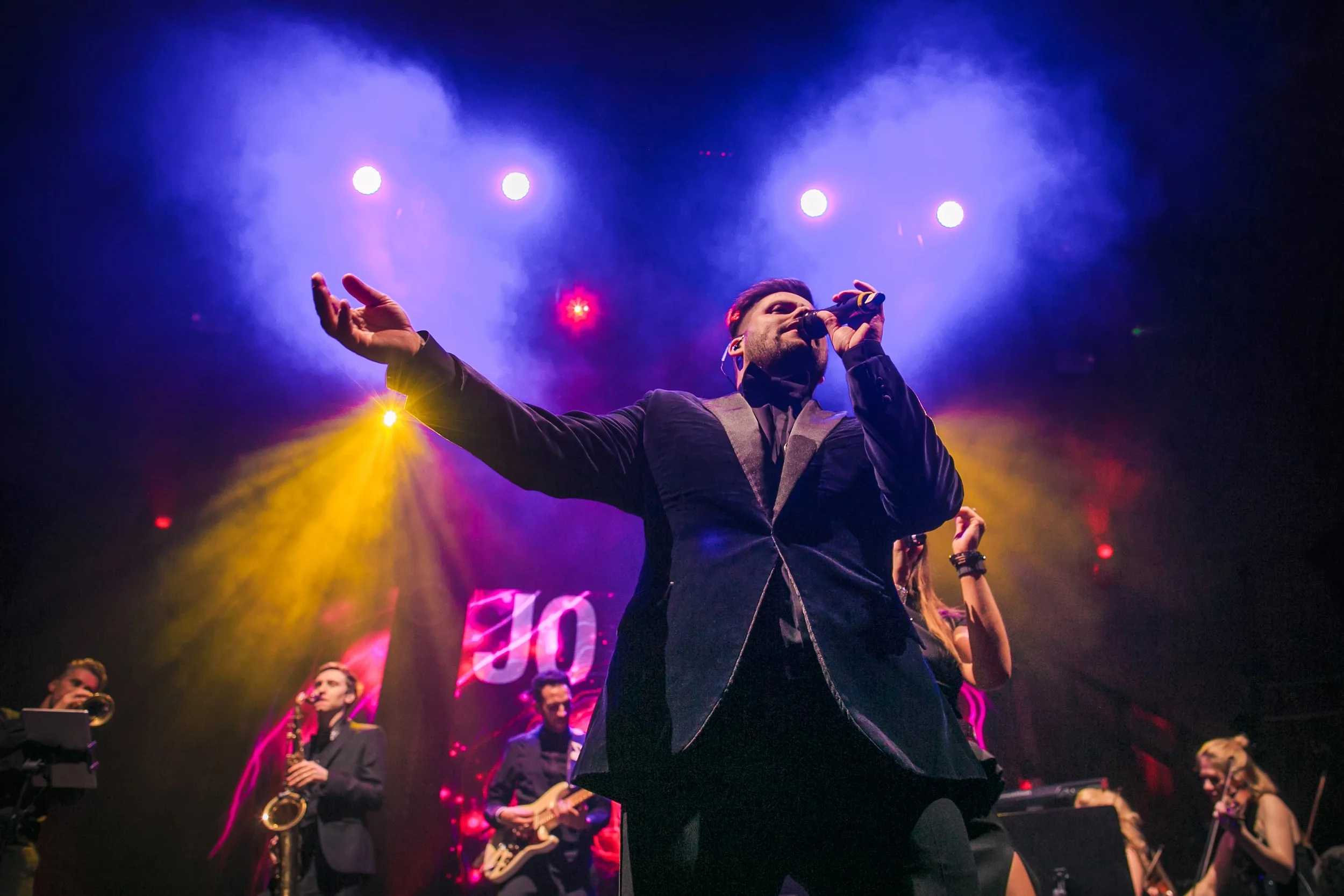 Live singer performing during a corporate awards ceremony