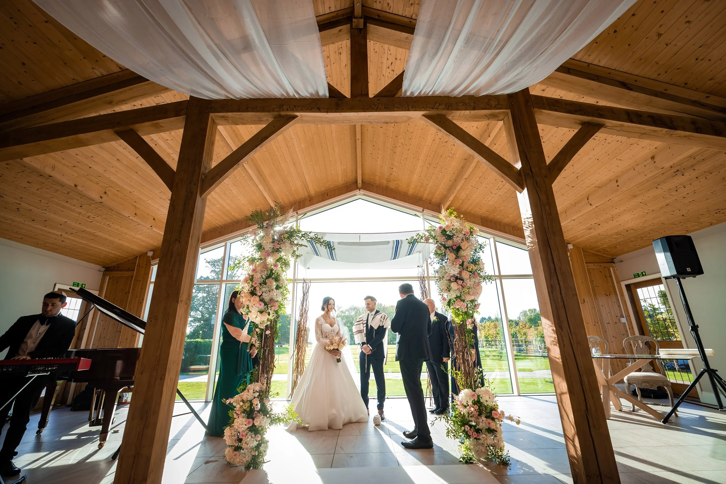 Merrydale Manor wedding ceremony in chapel with floral decor – wedding photography North West