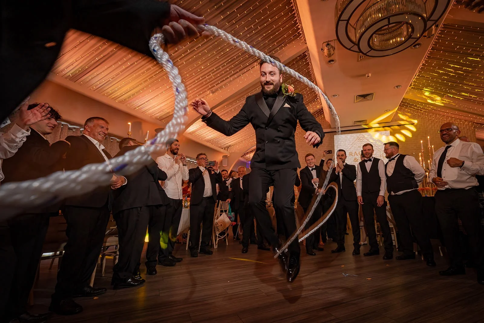 groom skips rope during reception party at colshaw hall wedding venue