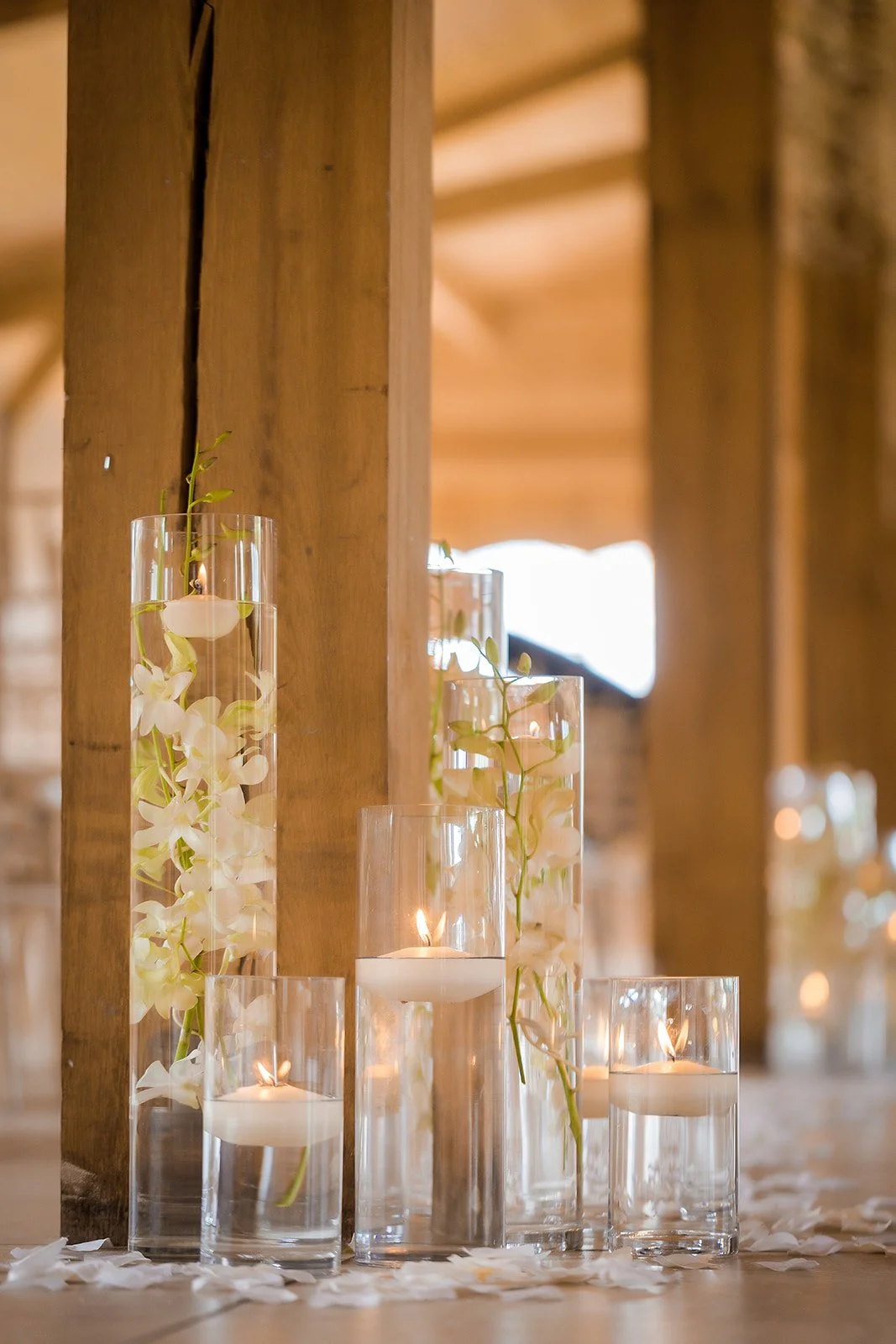 Merrydale Manor wedding reception floating candles and orchids detail – fine art wedding photographer North West