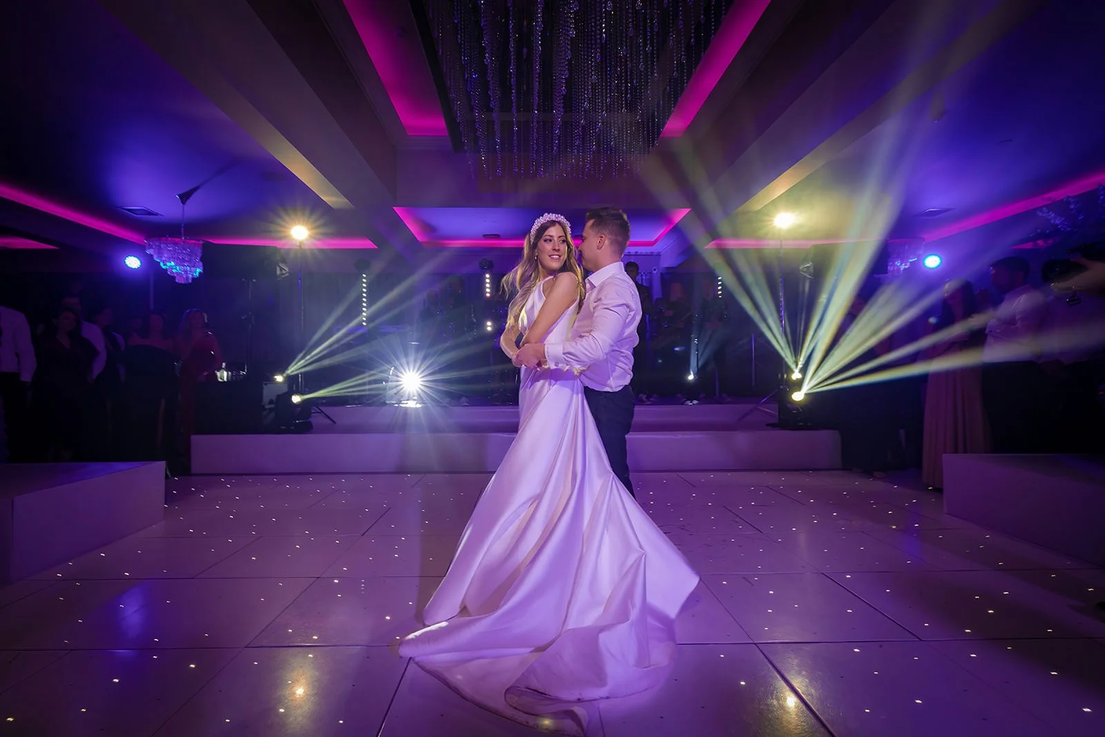 Merrydale Manor wedding couple dancing in venue with purple lighting – wedding photography Cheshire