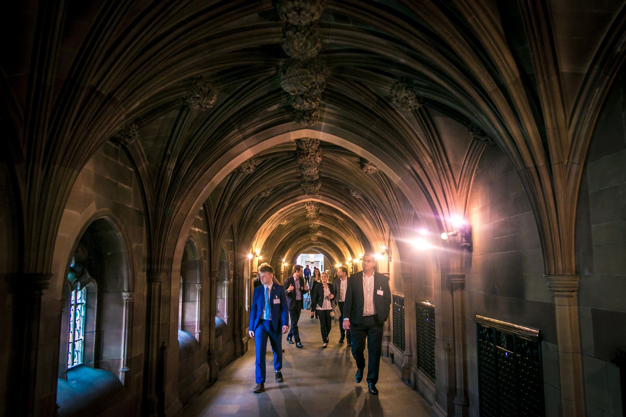 Guests networking inside Manchester Town Hall during a corporate event