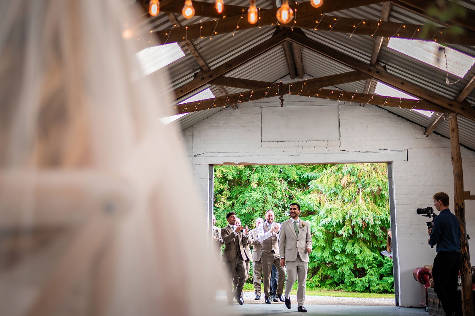 groom arrives for bedeken in piggery at white syke fields wedding venue in yorkshire