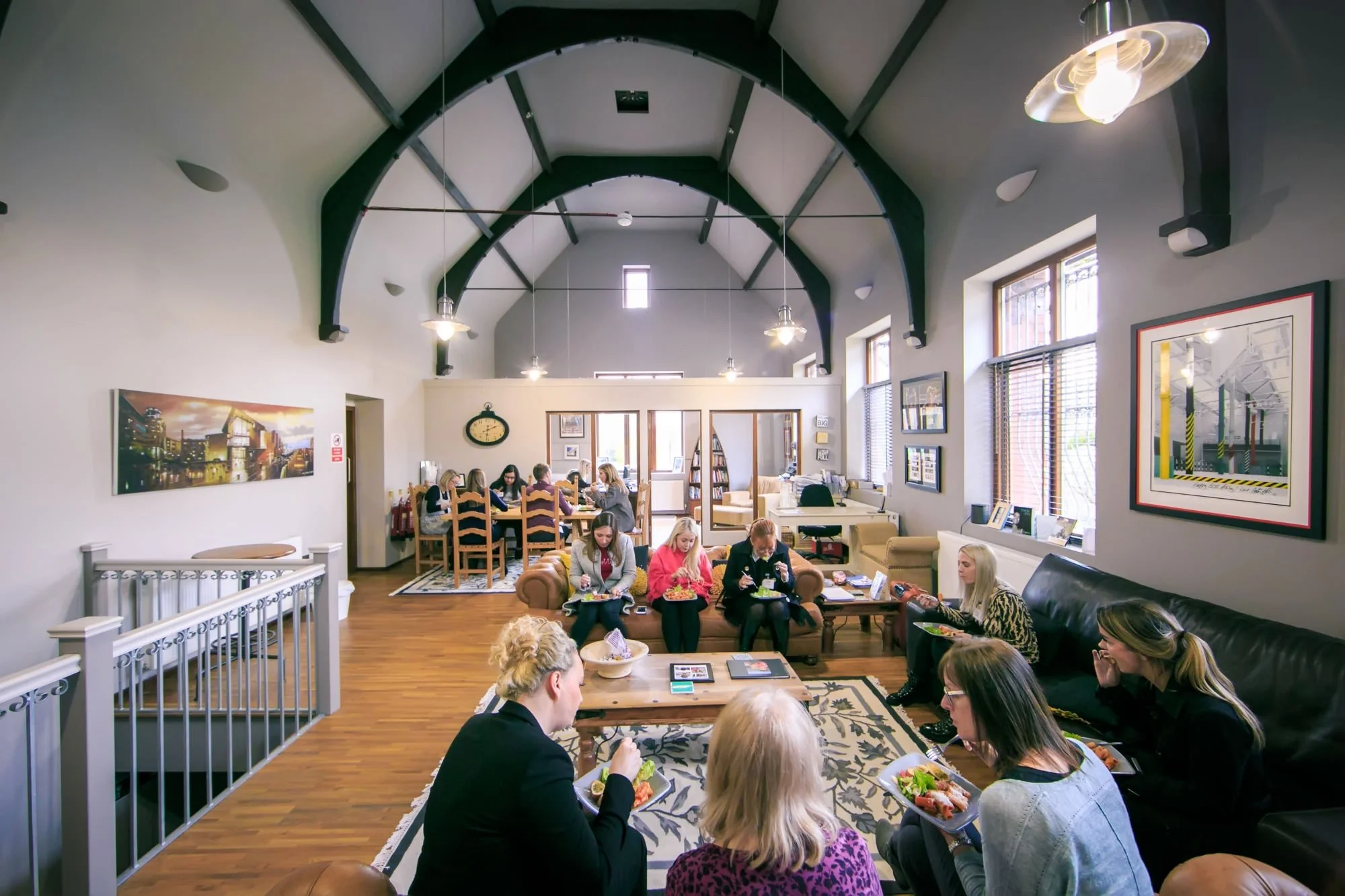 Delegates attending a networking event at a professional training venue