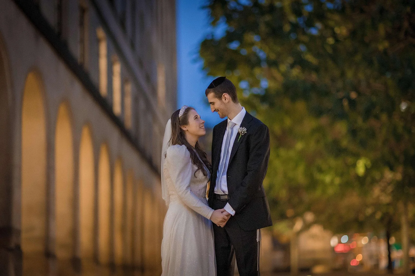 dusk bride and groom newlywed couple portrait in manchester city center