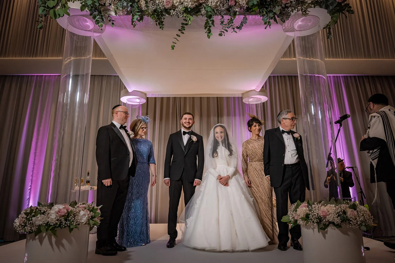 bride and groom exchange vows during wedding ceremony at manchester deansgate hotel