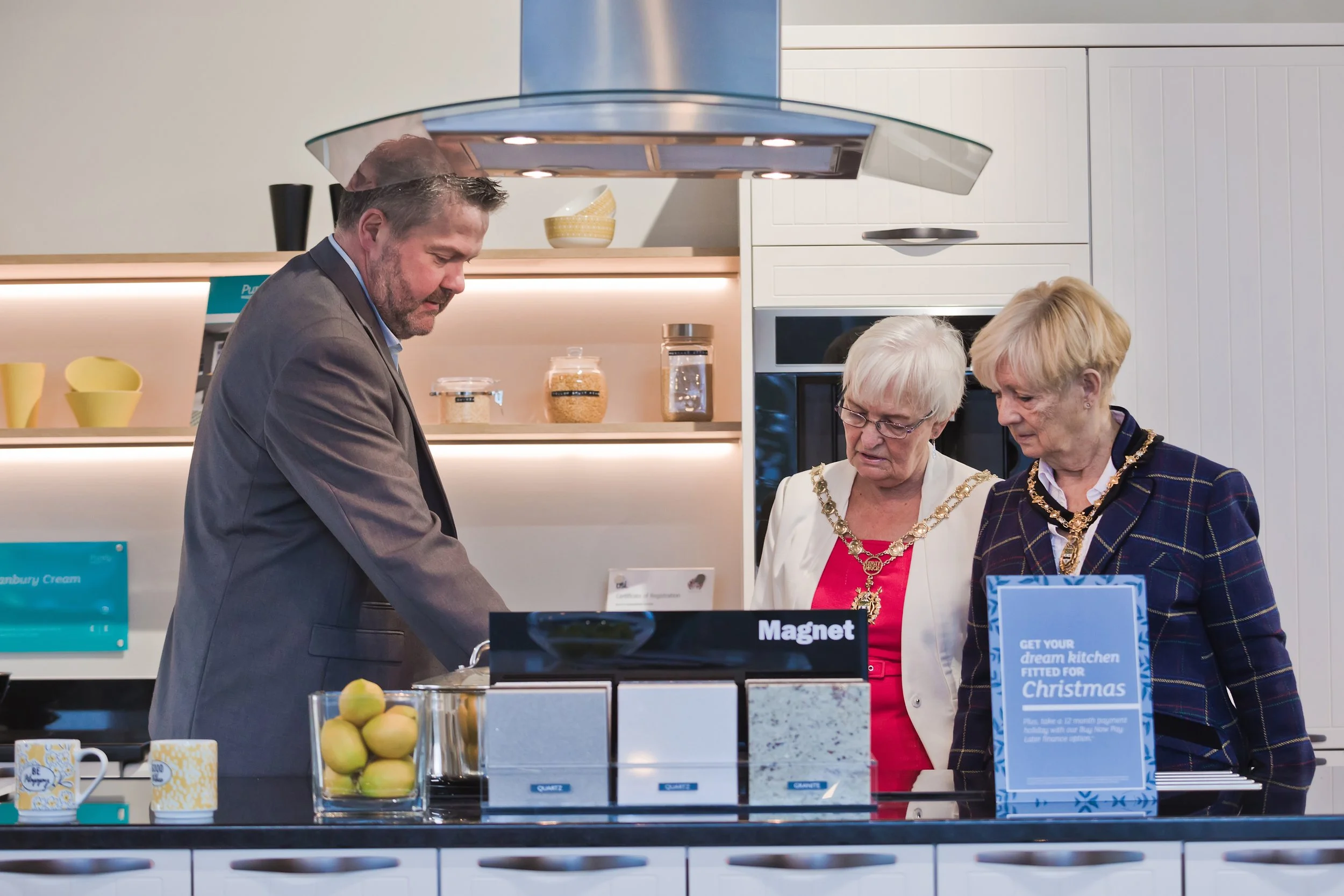 Publicity photography during a business showroom launch event