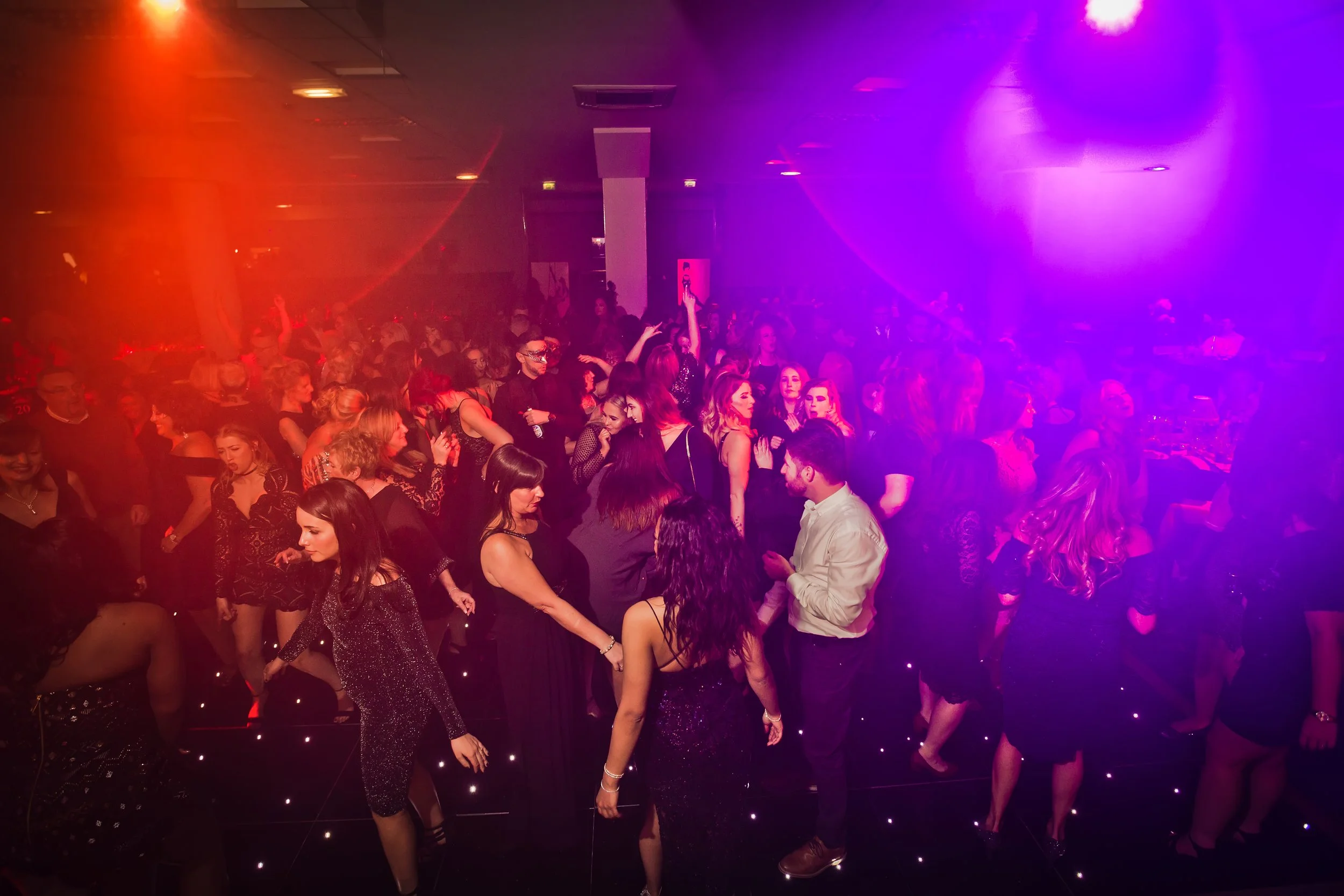 Guests celebrating at a corporate event in Manchester