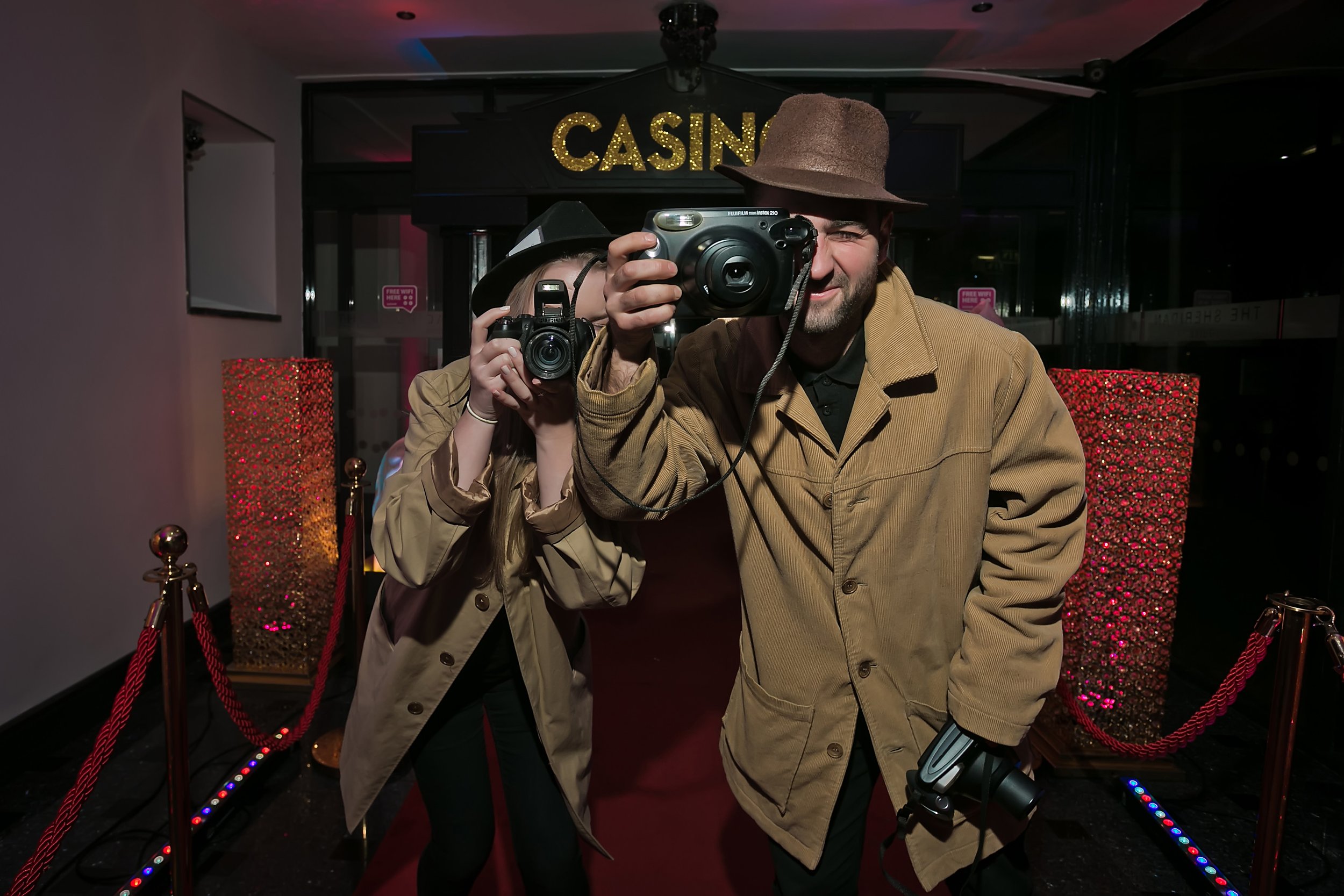 Event photographer capturing guests at a themed corporate event