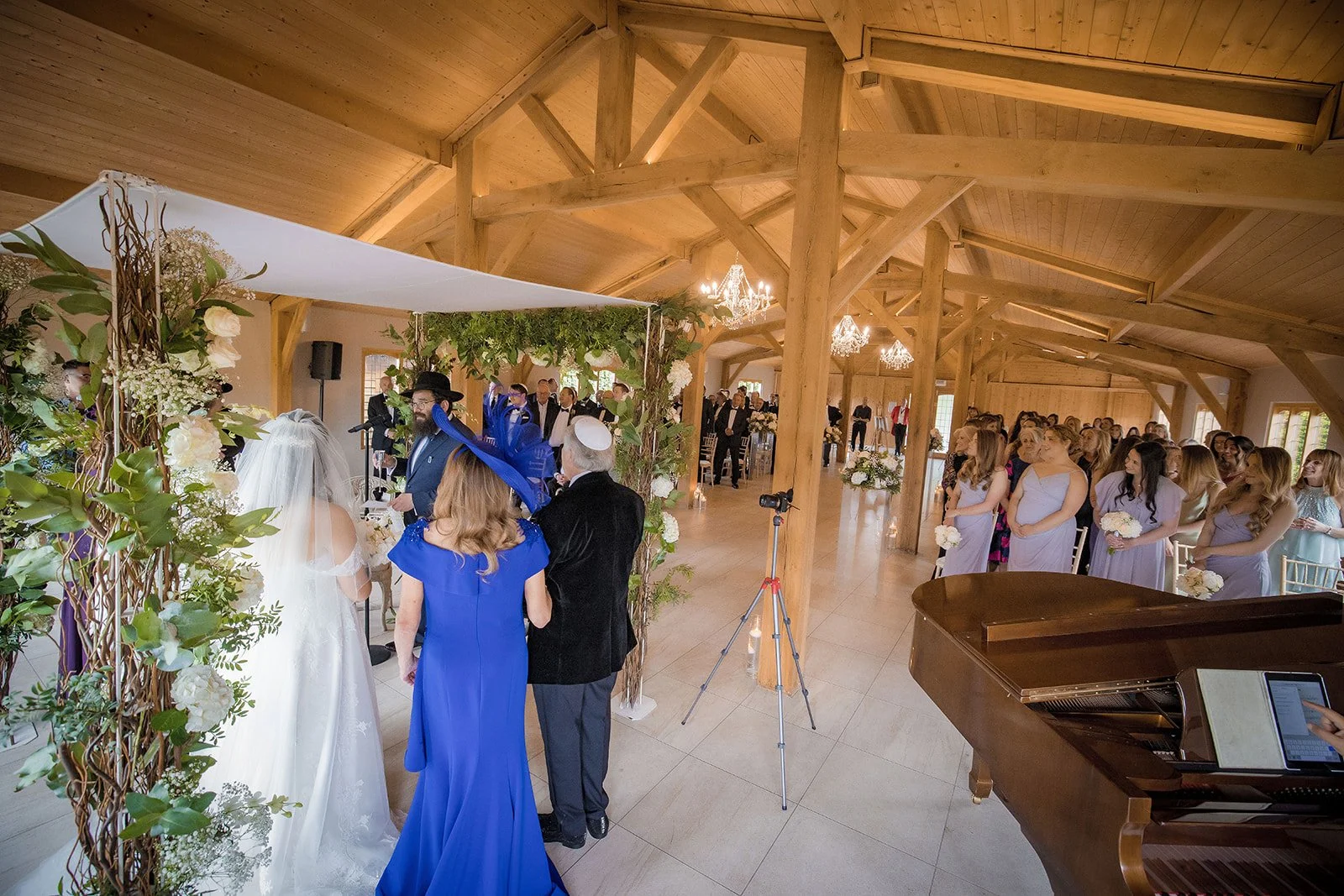 Merrydale Manor wedding guests standing for couple at altar – Manchester wedding photographer