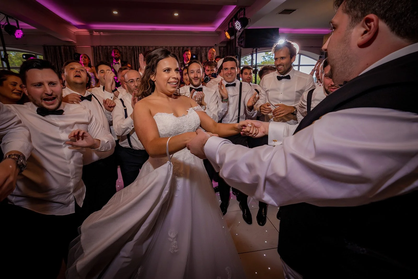 Merrydale Manor wedding couple first dance guests cheering – wedding photography Cheshire