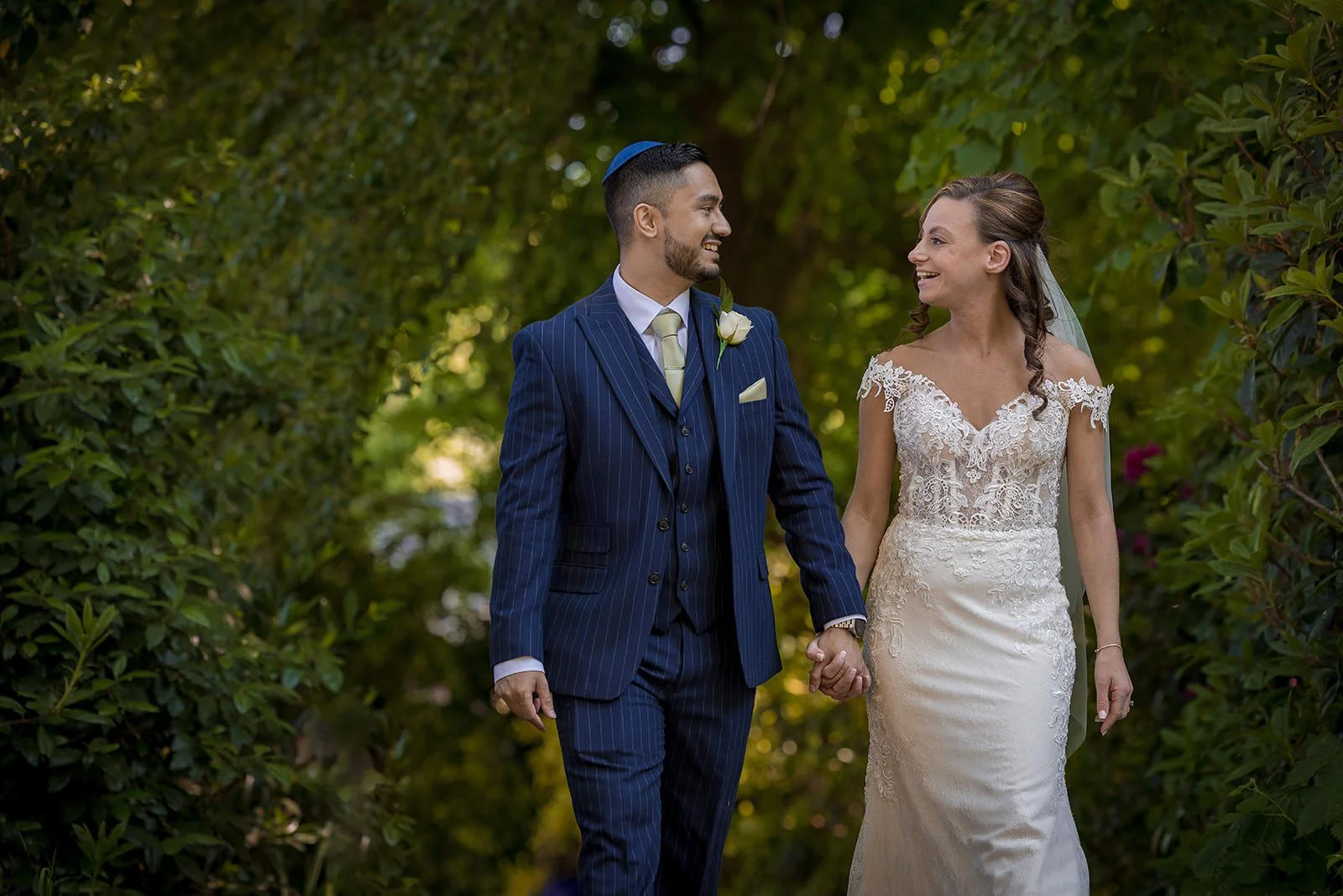 newlywed bride and groom portrait outdoors at worsley marriott hotel wedding venue
