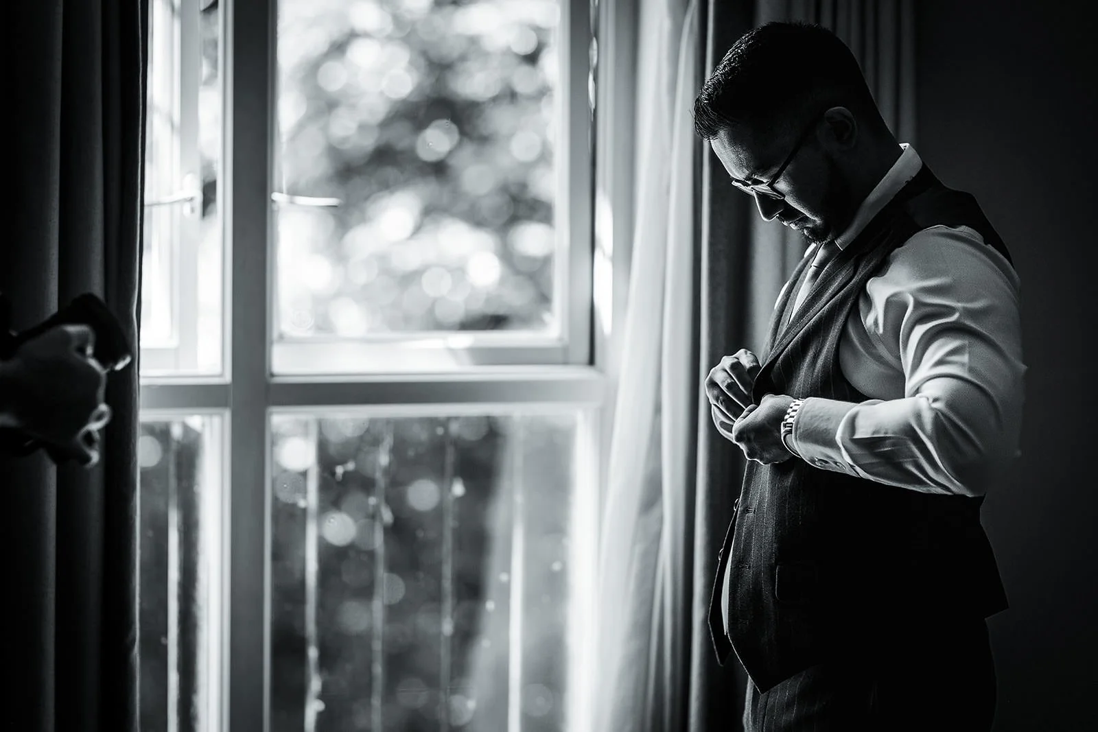 groom getting ready during prep at worsley marriott hotel wedding venue